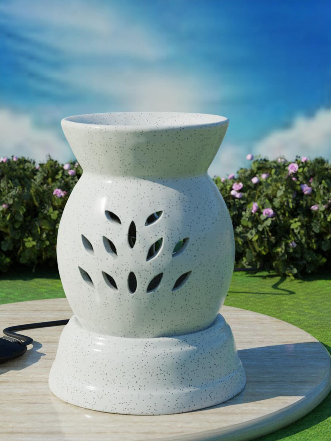 

The Earth Store White Mudra Ceramic Electric Aroma Oil Diffuser