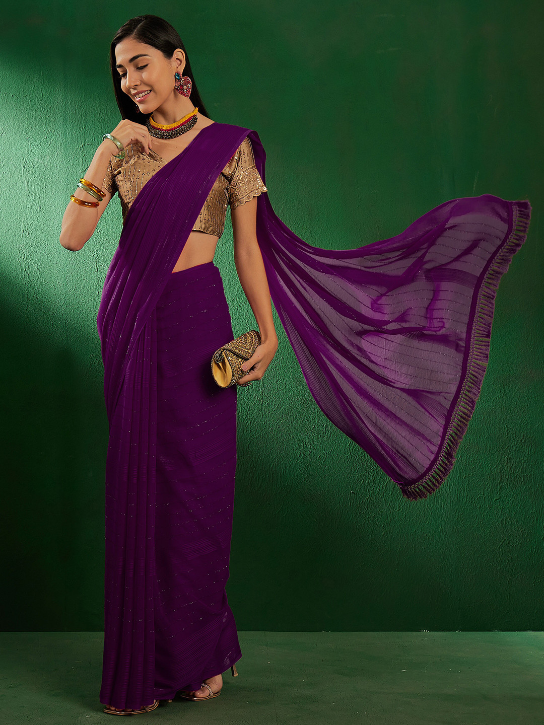 

Sangria Purple Striped Embellished Saree