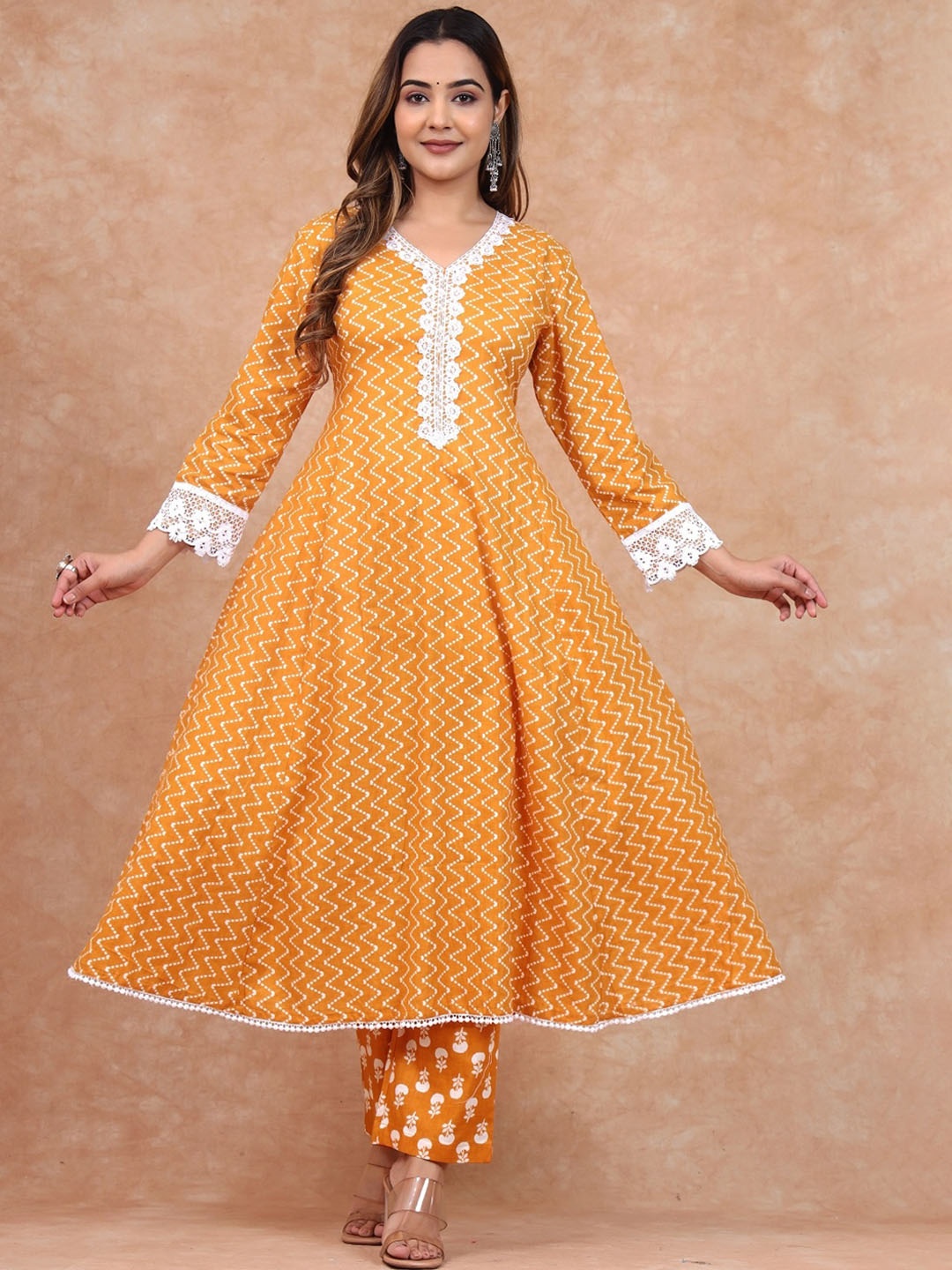 

Sangria Geometric Printed Pure Cotton A-Line Kurta With Trouser Set, Mustard
