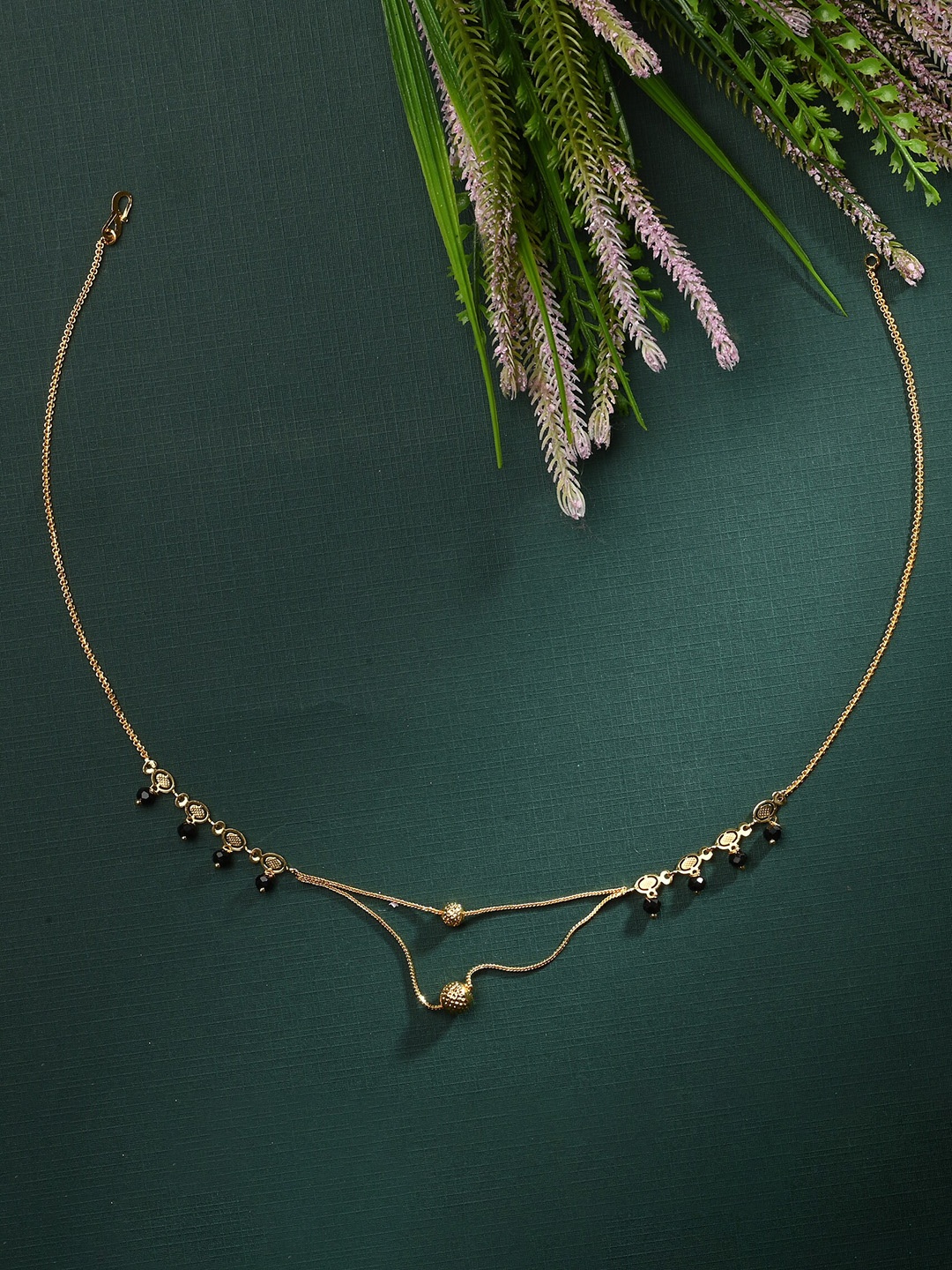 

AanyaCentric Gold-Plated AD-Studded Mangalsutra, Earring & Ring Set