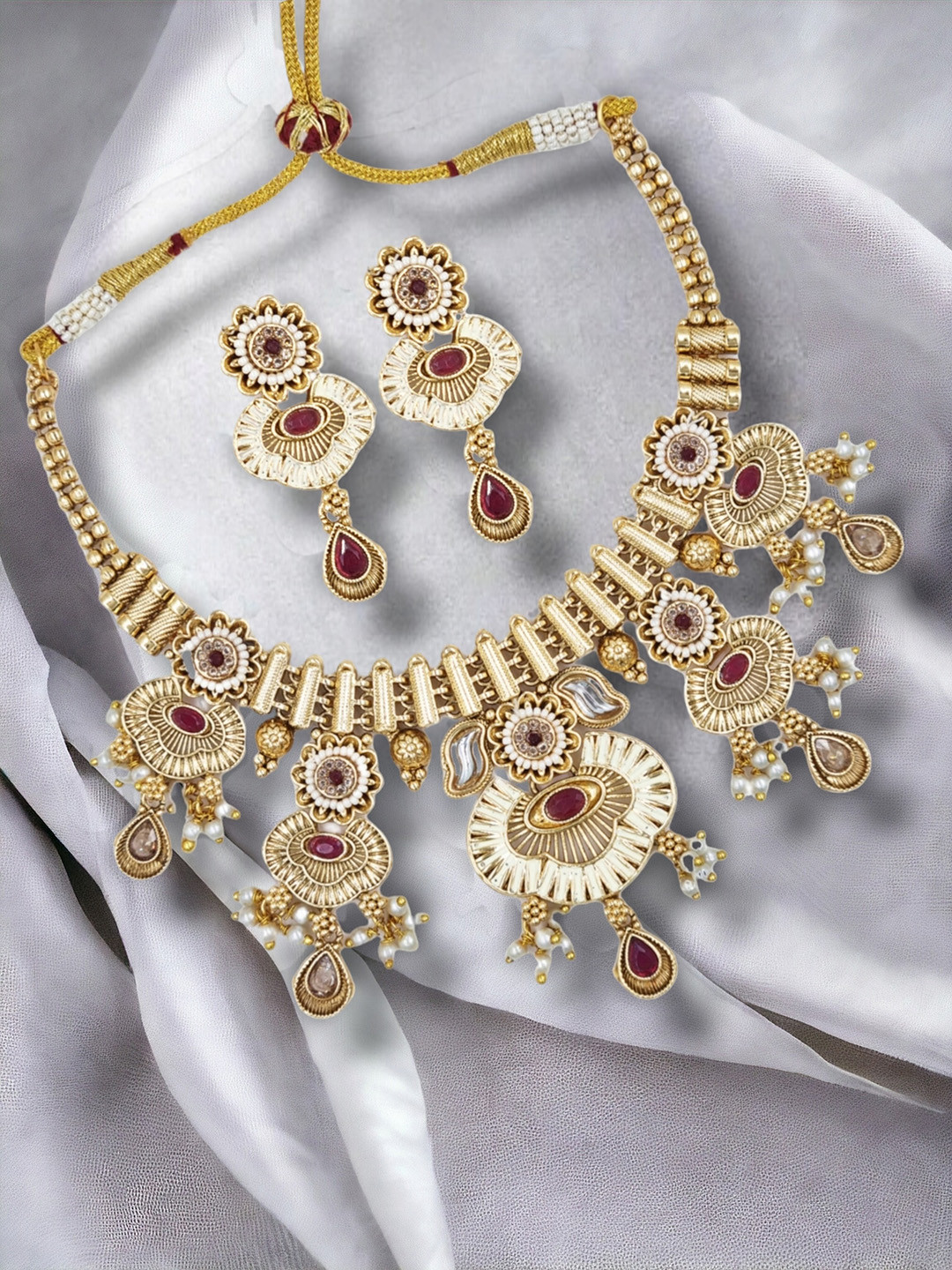 

Anouk Gold-Plated Kundan Studded Jewellery Set