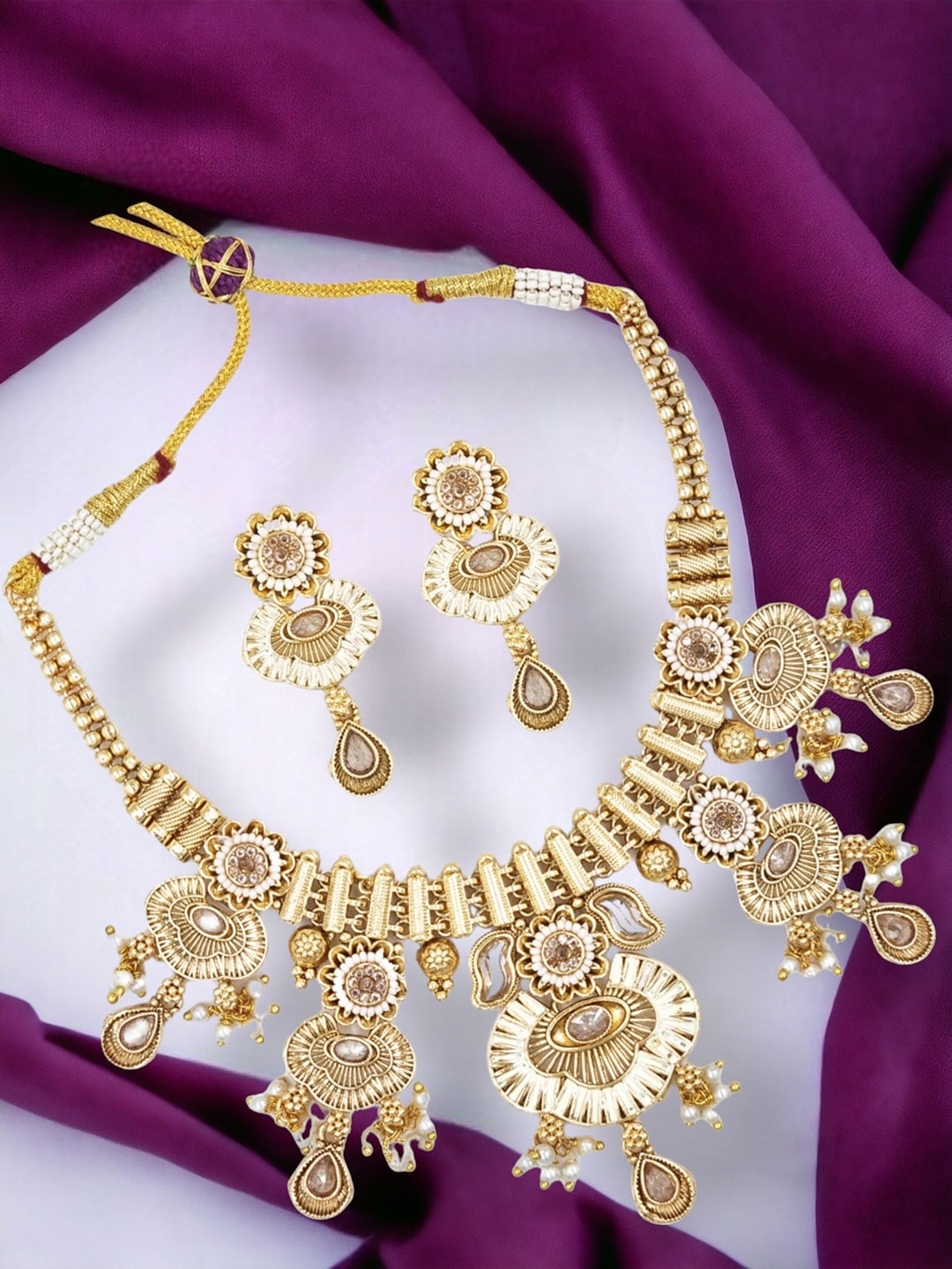 

Anouk Gold Plated Stones Studded & Beaded Jewellery Set