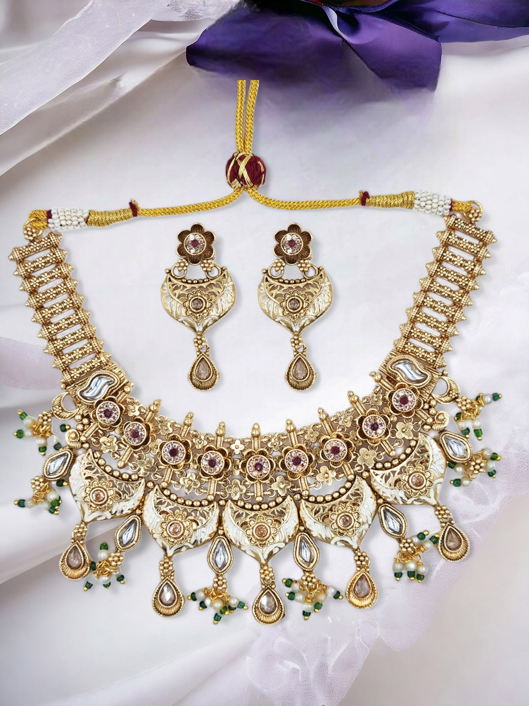 

Anouk Gold-Plated Kundan Studded Jewellery Set