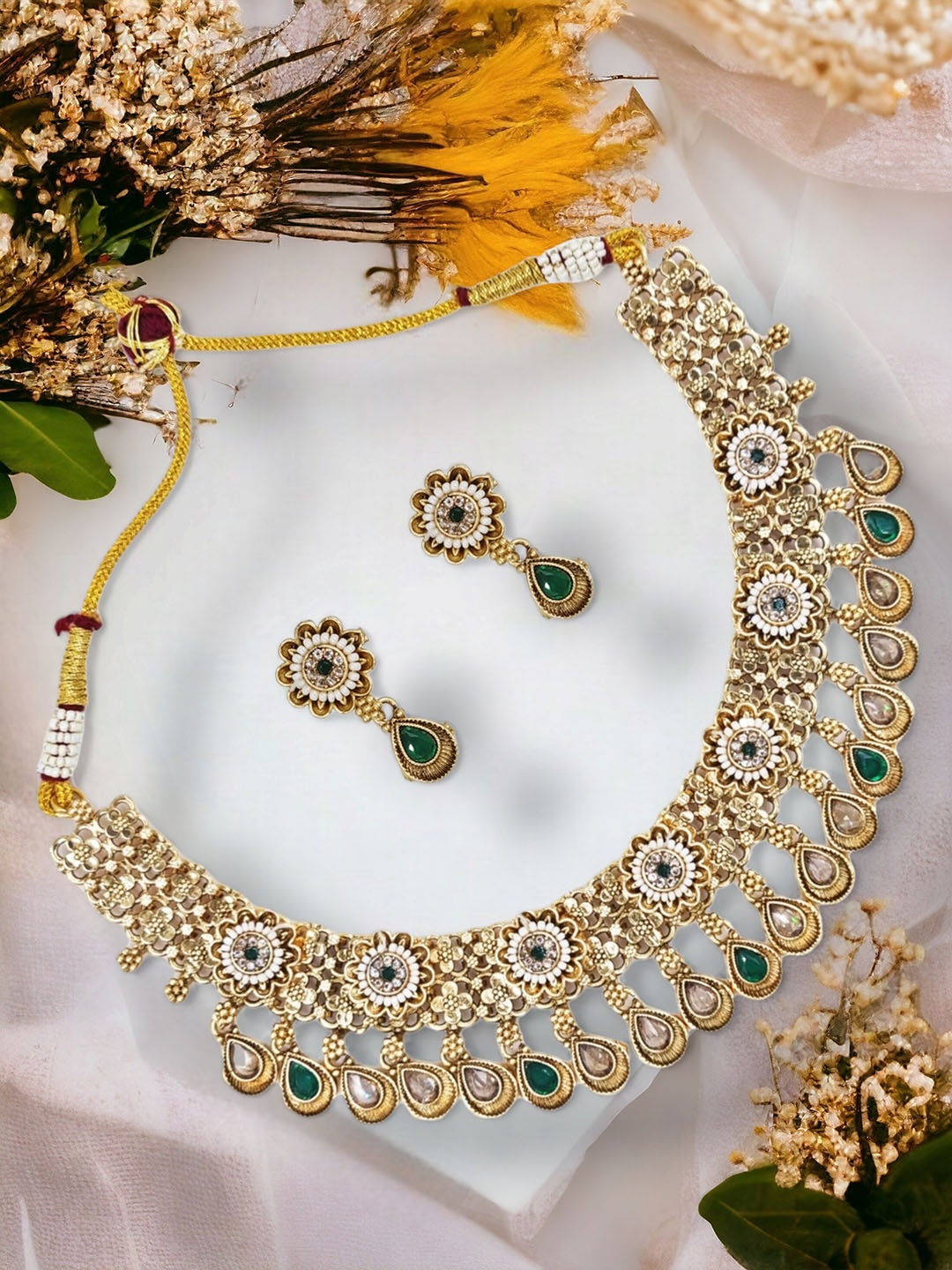 

Anouk Gold Plated Stones Studded & Beaded Jewellery Set