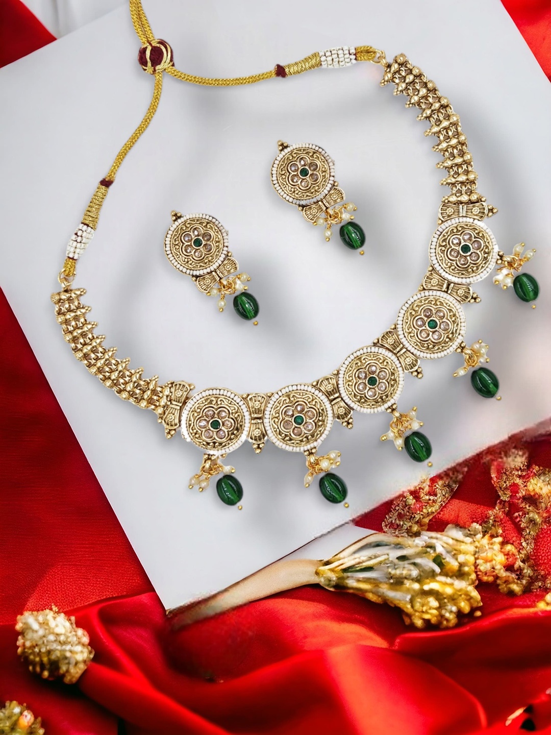 

Anouk Gold Plated Stones Studded & Beaded Jewellery Set