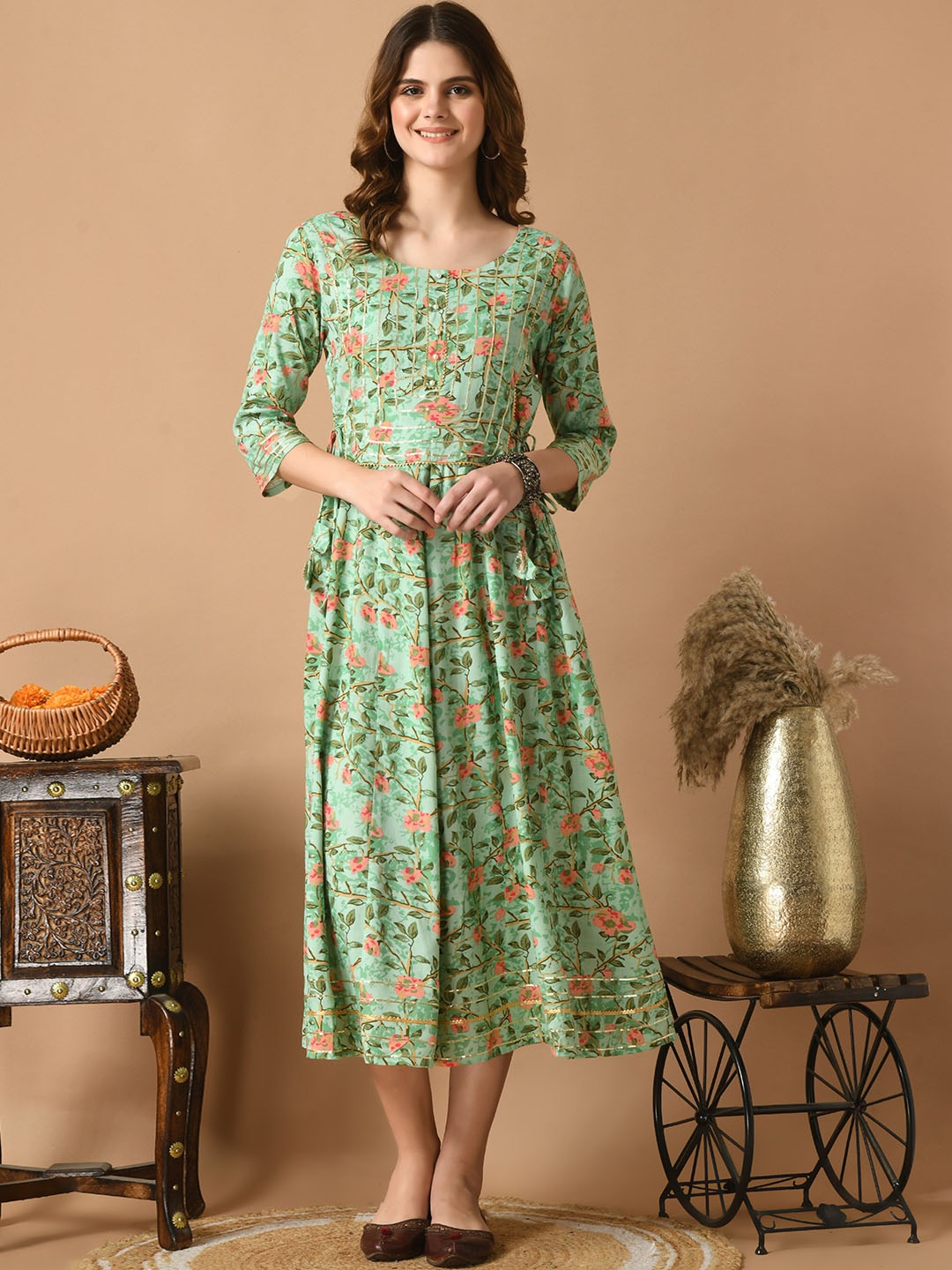 

KALINI Women Floral Printed Sequinned Floral Anarkali Kurta, Turquoise blue