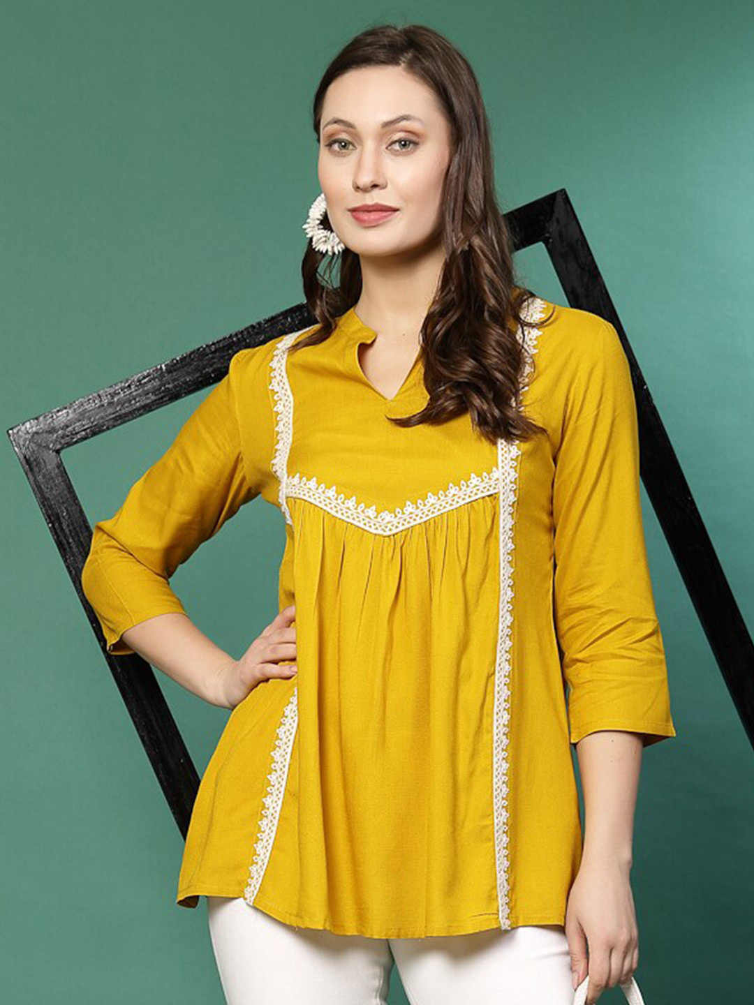 

Sangria Ethnic Motifs Embroidered Longline Top, Mustard
