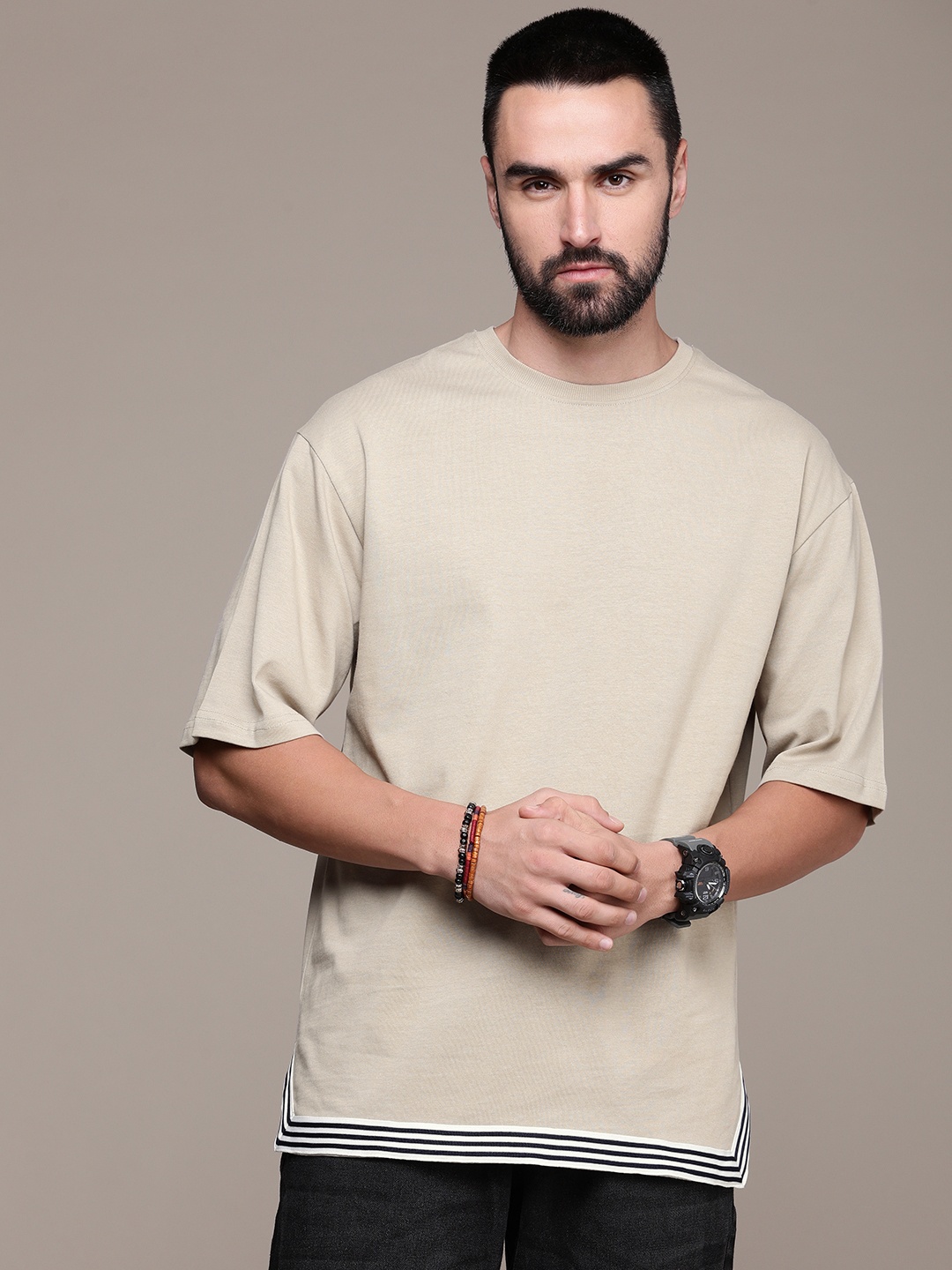 

Roadster Men Drop-Shoulder Sleeves Pure Cotton T-shirt, Beige