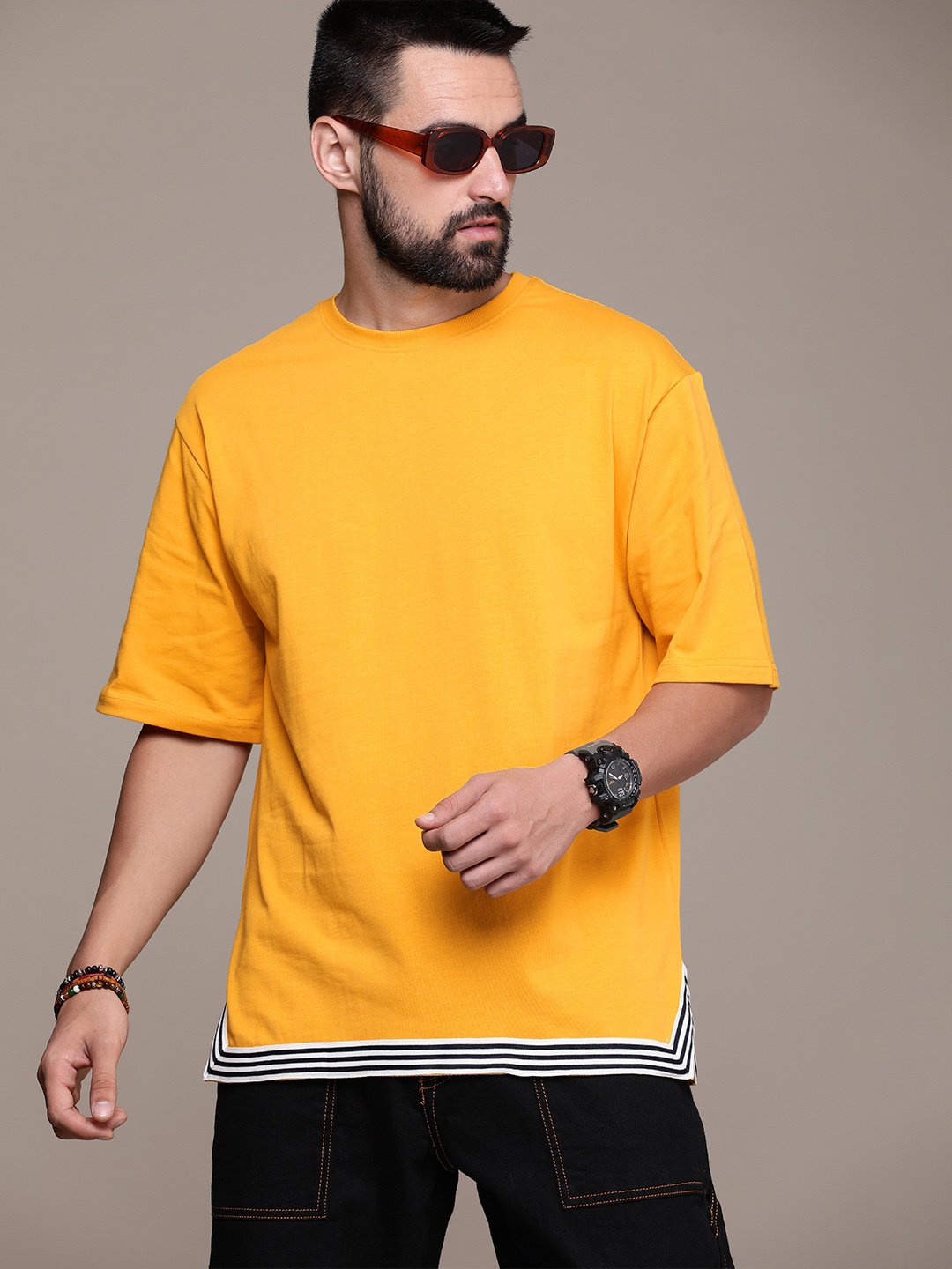 

Roadster Men Drop-Shoulder Sleeves Pure Cotton T-shirt, Mustard