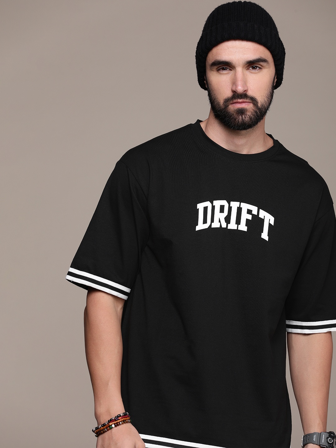 

Roadster Men Typography Printed Drop-Shoulder Sleeves Pure Cotton T-shirt, Black