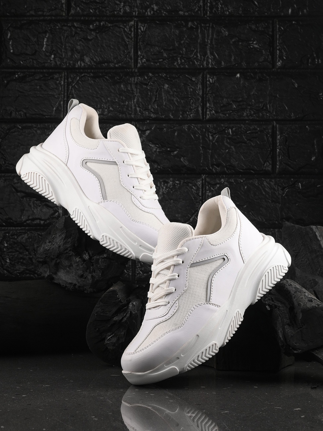 

The Roadster Lifestyle Co. Women White Textured Round Toe Sneakers