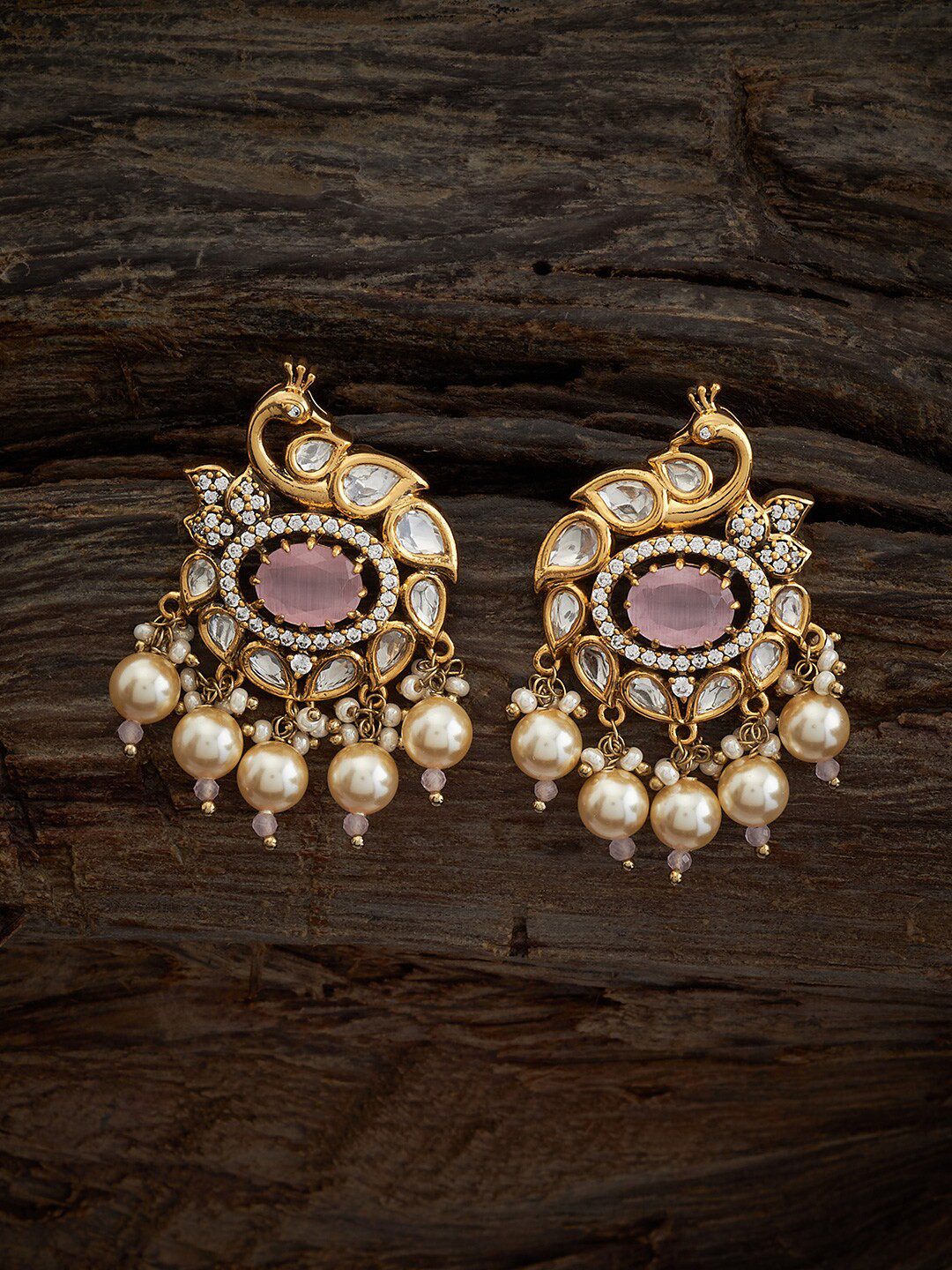 

Kushal's Fashion Jewellery Kundan Studded Peacock Shaped Stud Earrings, Gold