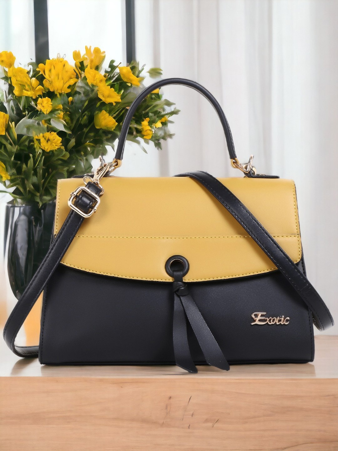 

Exotic Colourblocked Structured Handheld Bag, Yellow