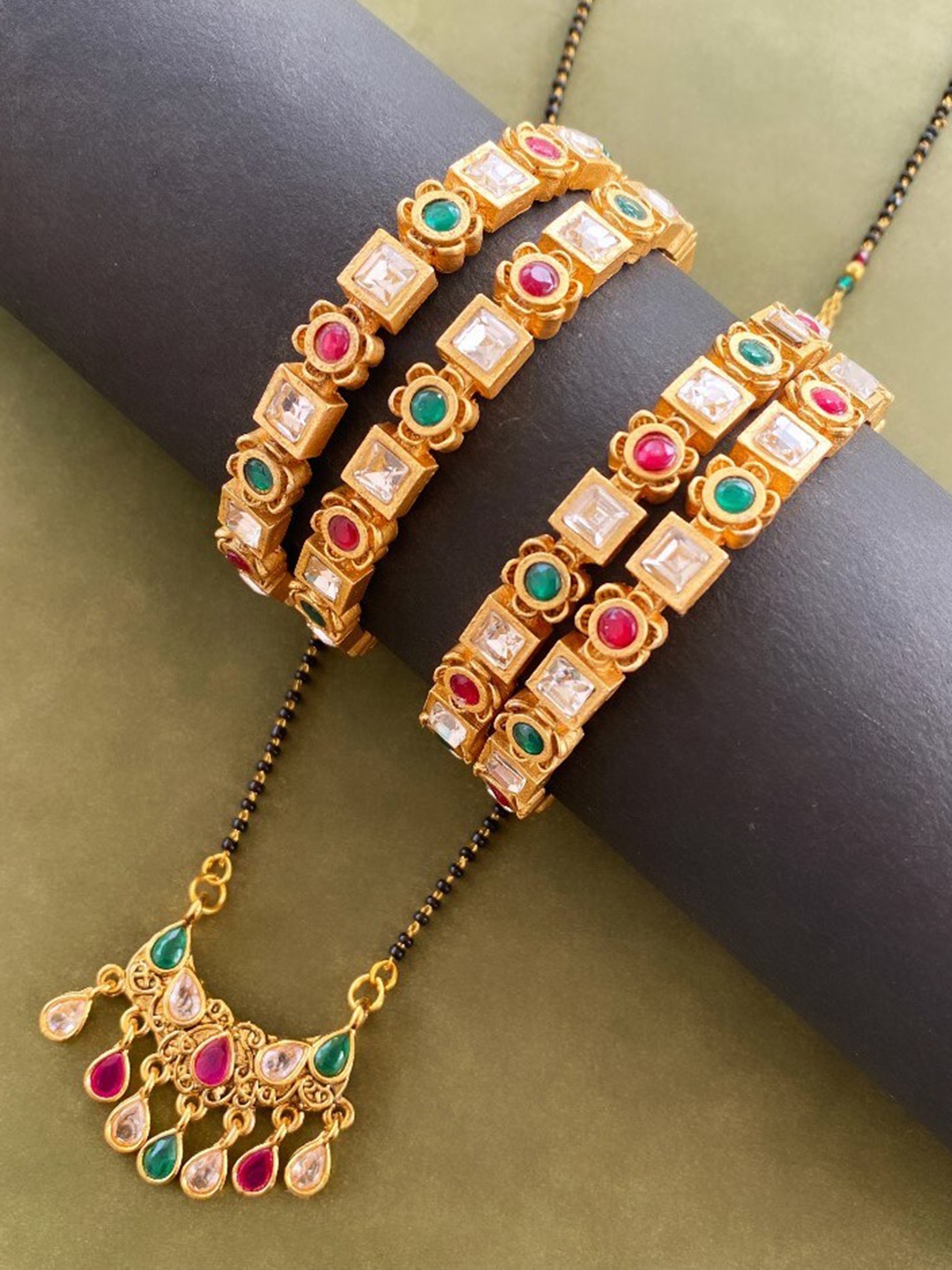 

ATIBELLE Set Of 5 Gold Plated & Stone Studded Floral Shaped Mangalsutra & Bangles