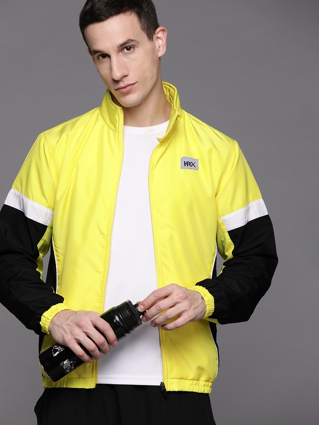 

HRX by Hrithik Roshan Men Colourblocked Windcheater Running Sporty Jacket, Yellow
