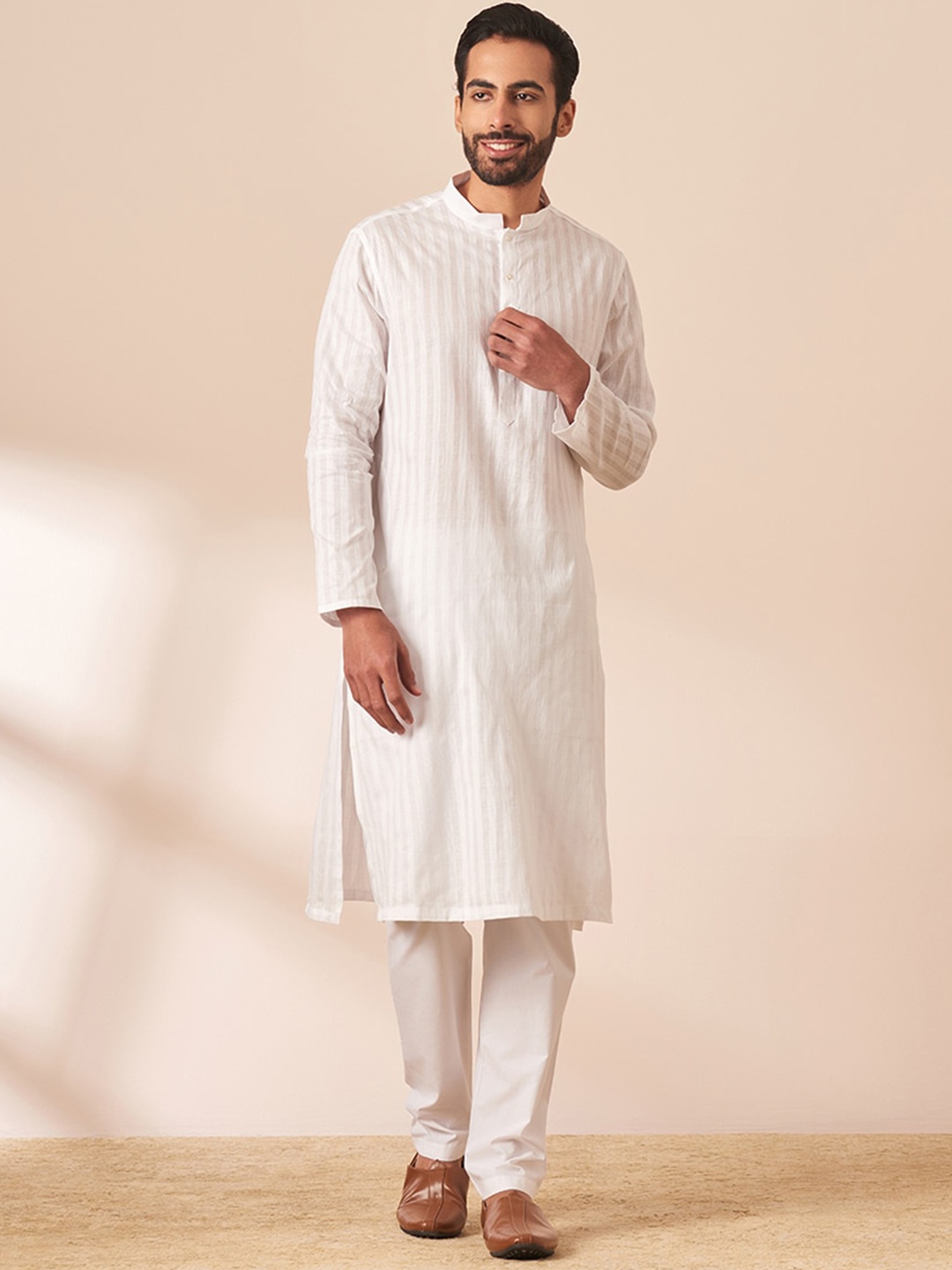 

Manyavar Mandarin Collar Long Sleeves Thread Work Kurta, White
