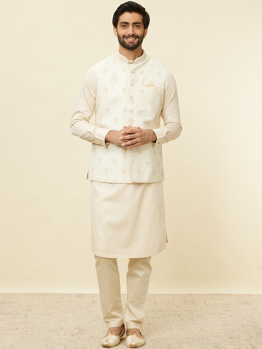

Manyavar Men Self-Design Woven Nehru Jackets, Cream