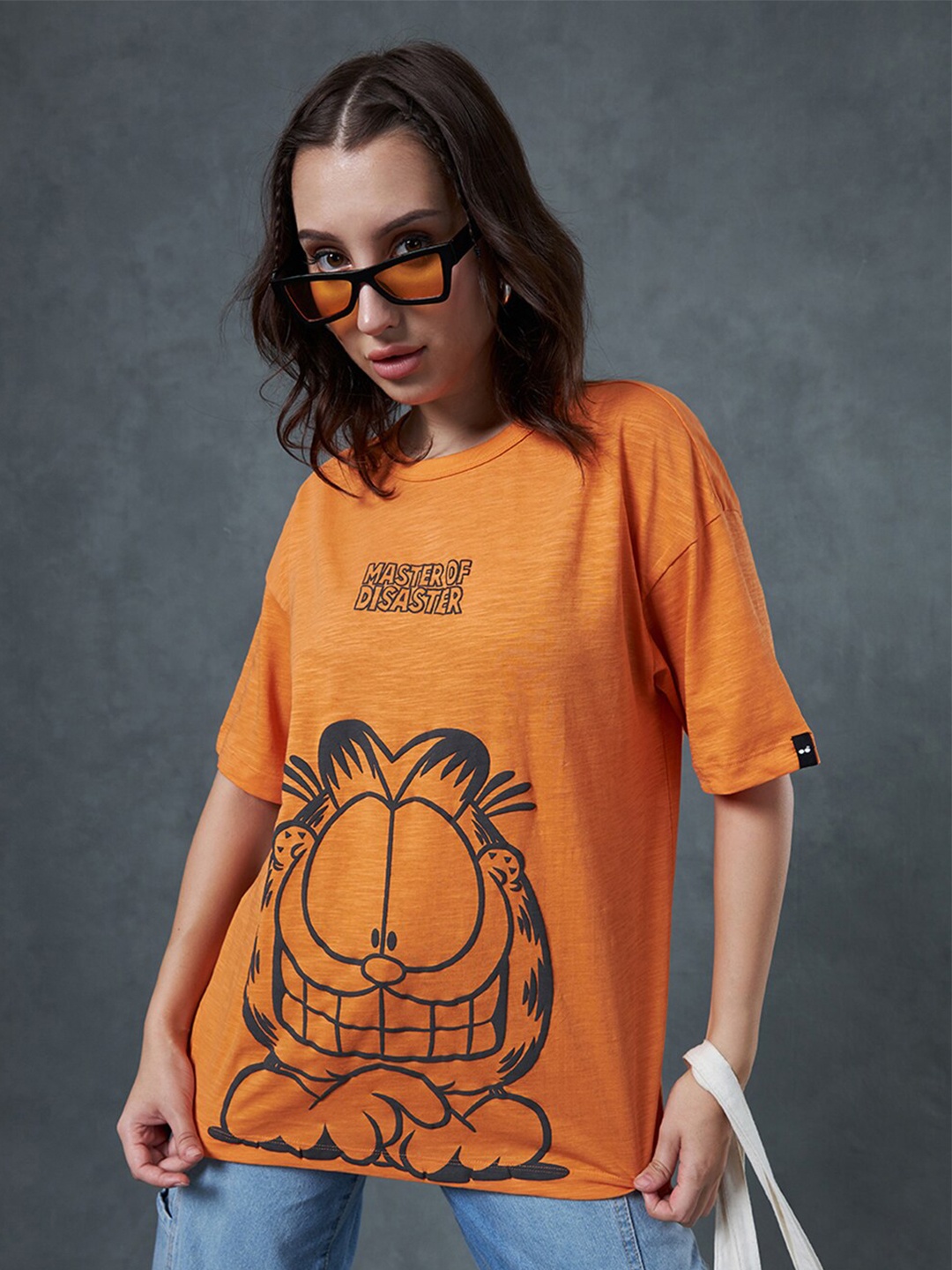 

Bewakoof Air 1.0 Garfield Women Graphic Printed Oversized T-shirt, Orange