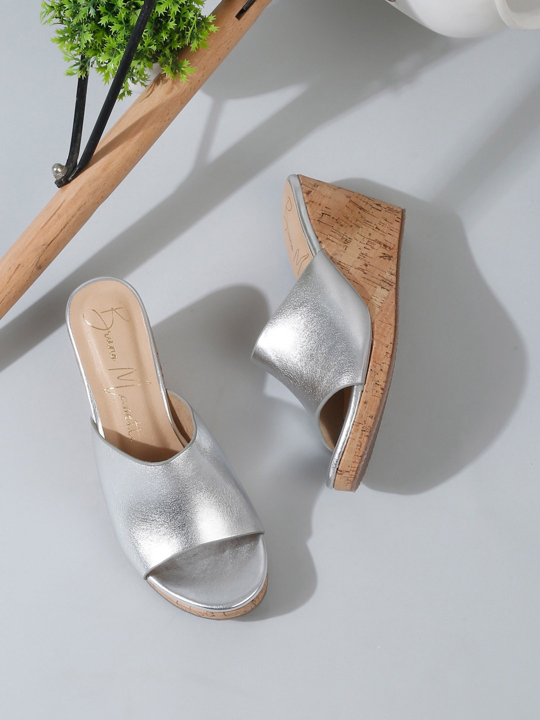 

Bruno Manetti Wedge Heeled Mules, Silver