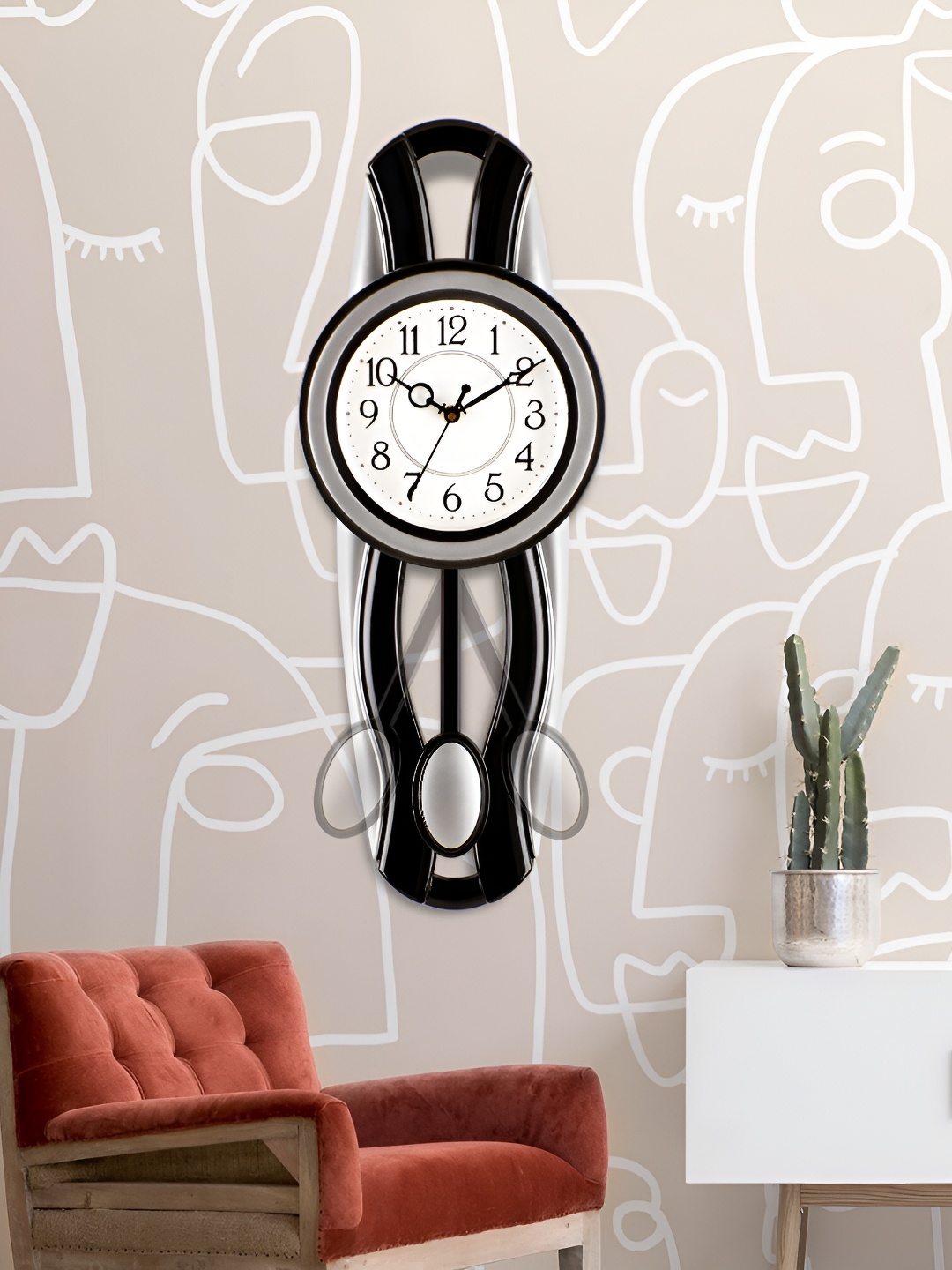 

Attractionz Silver-Toned Round Contemporary Pendulum Wall Clock