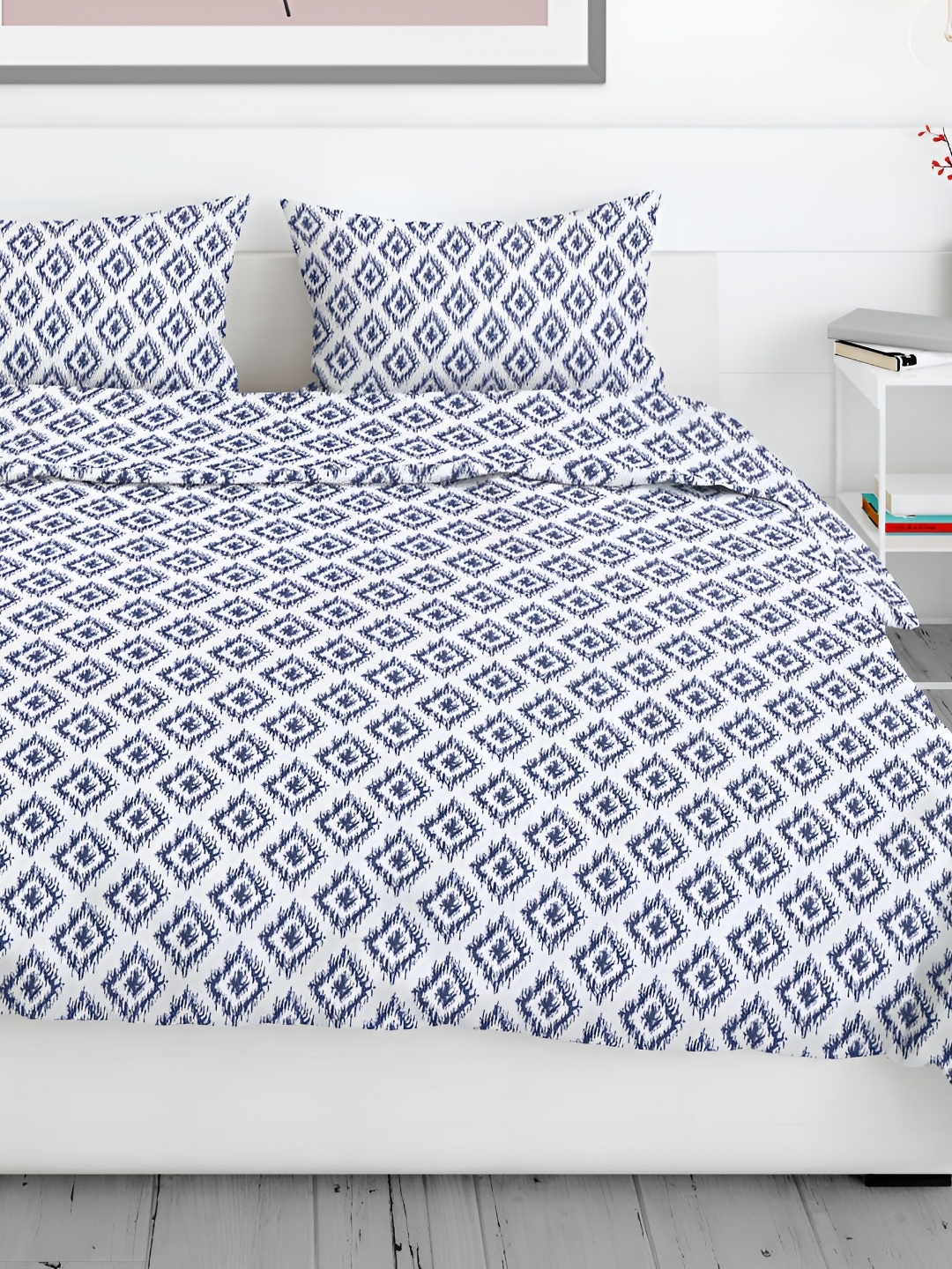 

Aura Blue & White Ethnic Motifs 200 TC Queen Bedsheet with 2 Pillow Covers