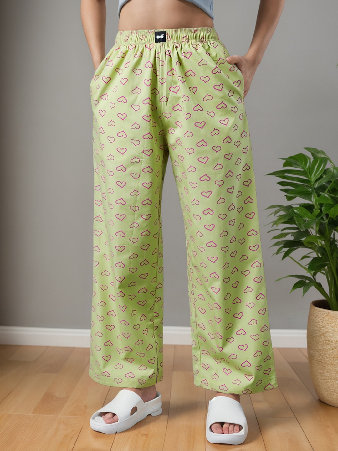

Bewakoof Women Printed Cotton Mid-Rise Oversized Trousers, Green