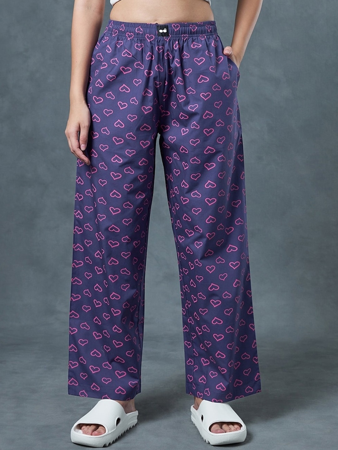 

Bewakoof Women Printed Cotton Mid-Rise Oversized Trousers, Purple