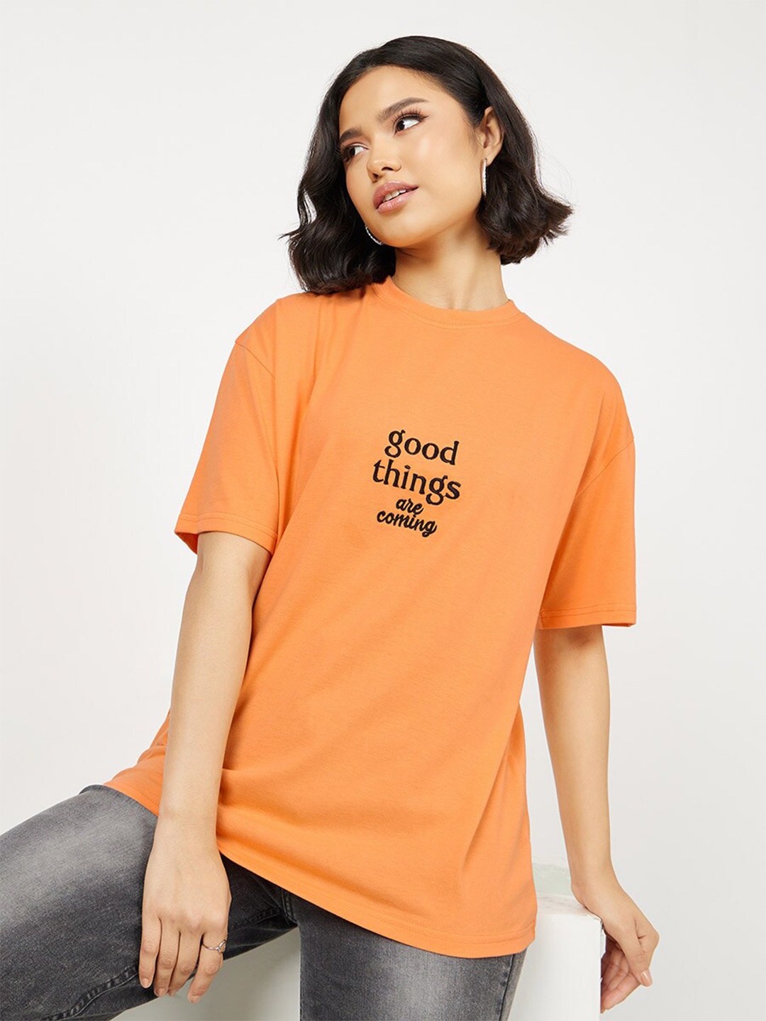 

Styli Orange Typography Printed Oversized Longline Cotton T-shirt