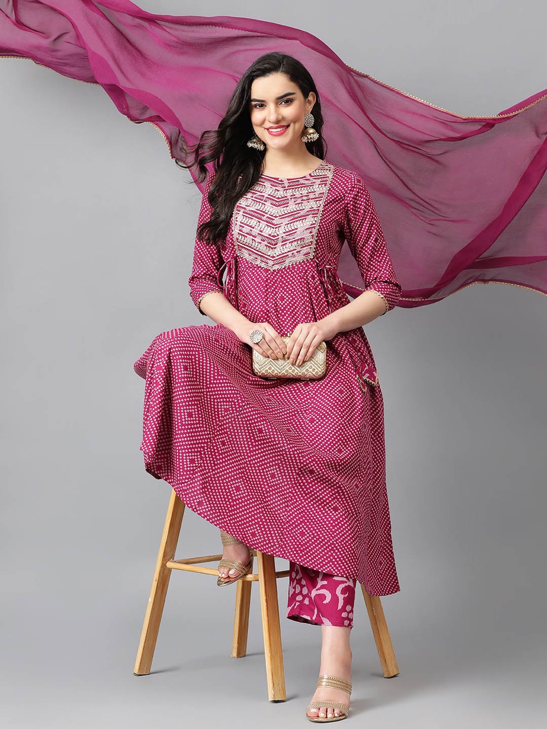 

Khushal K Women Printed Empire Thread Work Kurta with Trousers & With Dupatta, Purple