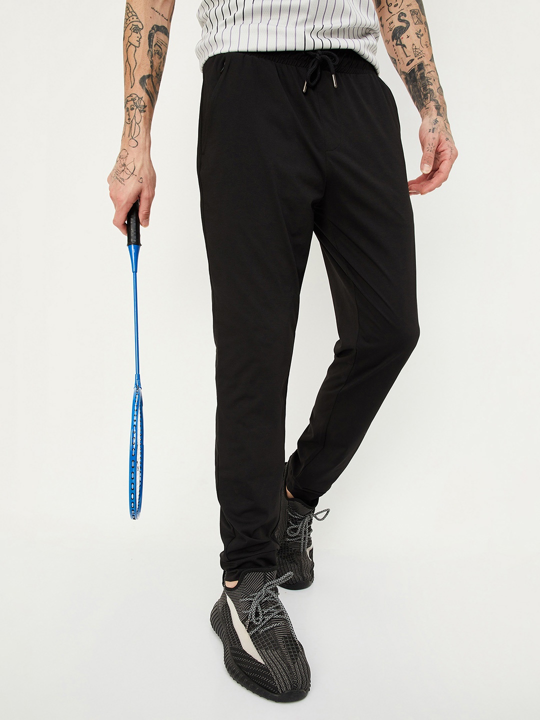 

max Men Solid Mid-Rise Joggers, Black