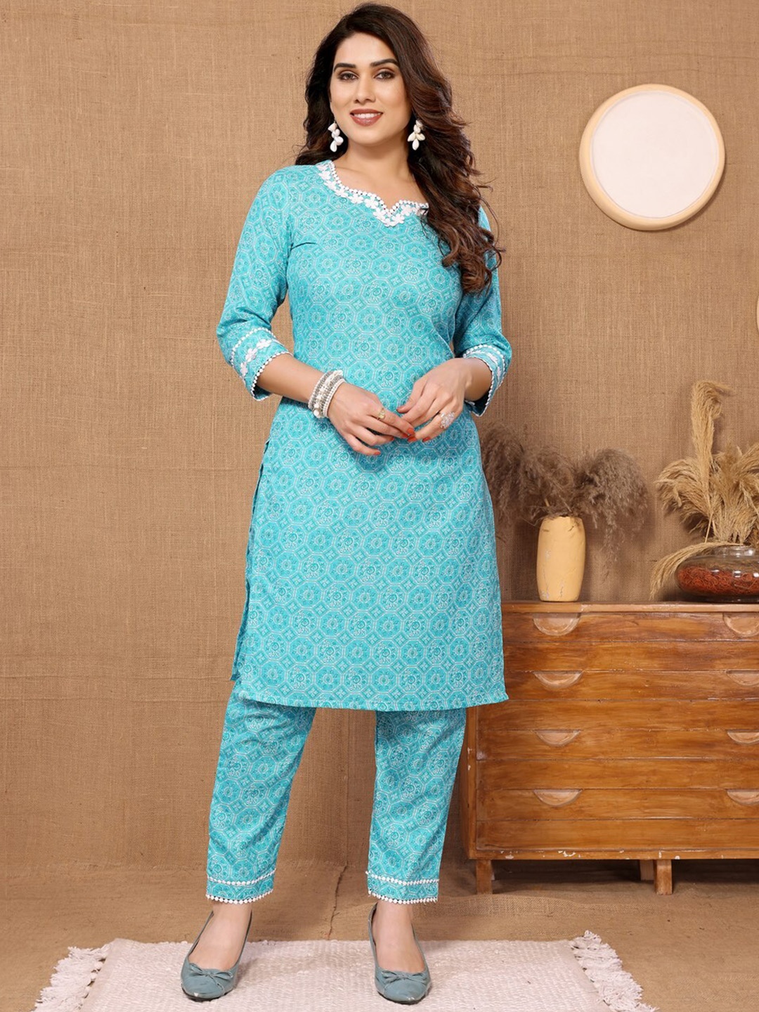 

Titanium Silk Industries Women Ethnic Motifs Printed Regular Kurta with Trousers, Blue