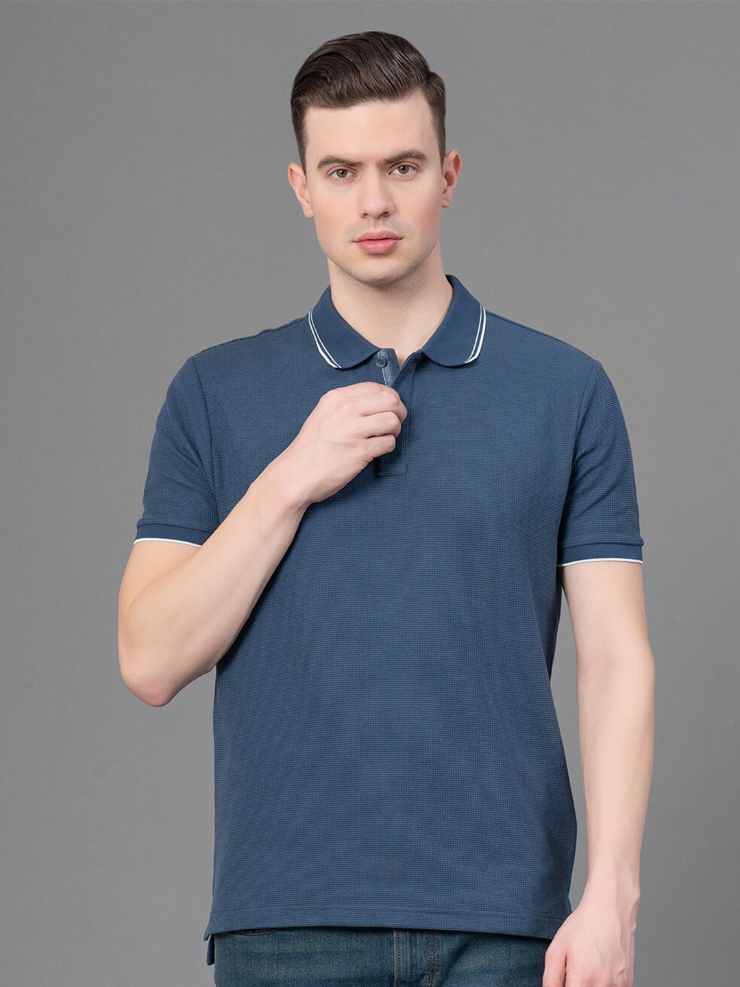 

Red Tape Men Midnight Stretch Self Design Polo T-Shirt, Blue