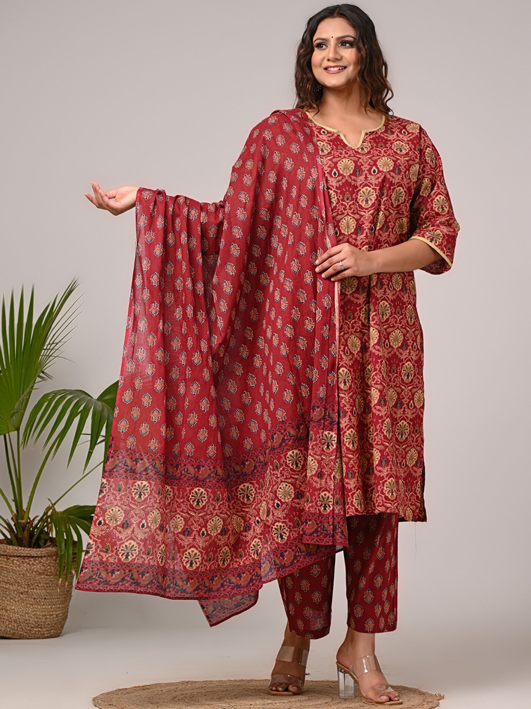 

Swasti Women Floral Printed Regular Sequinned Pure Cotton Kurta with Trousers & With Dupatta, Maroon
