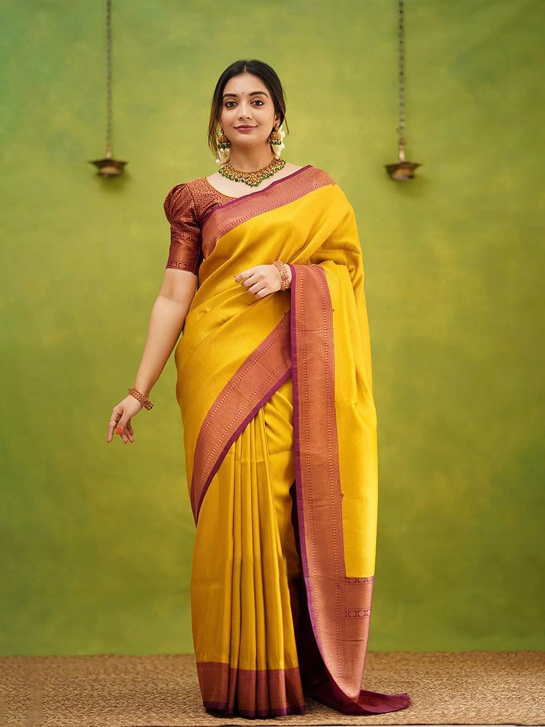 

Anjaneya Sarees Woven Design Zari Silk Blend Banarasi Saree, Yellow