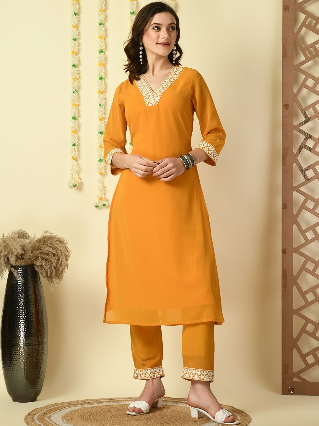 

KALINI Ethnic Motifs Yoke Design V-Neck Thread Work Georgette A-Line Kurta With Trouser, Mustard
