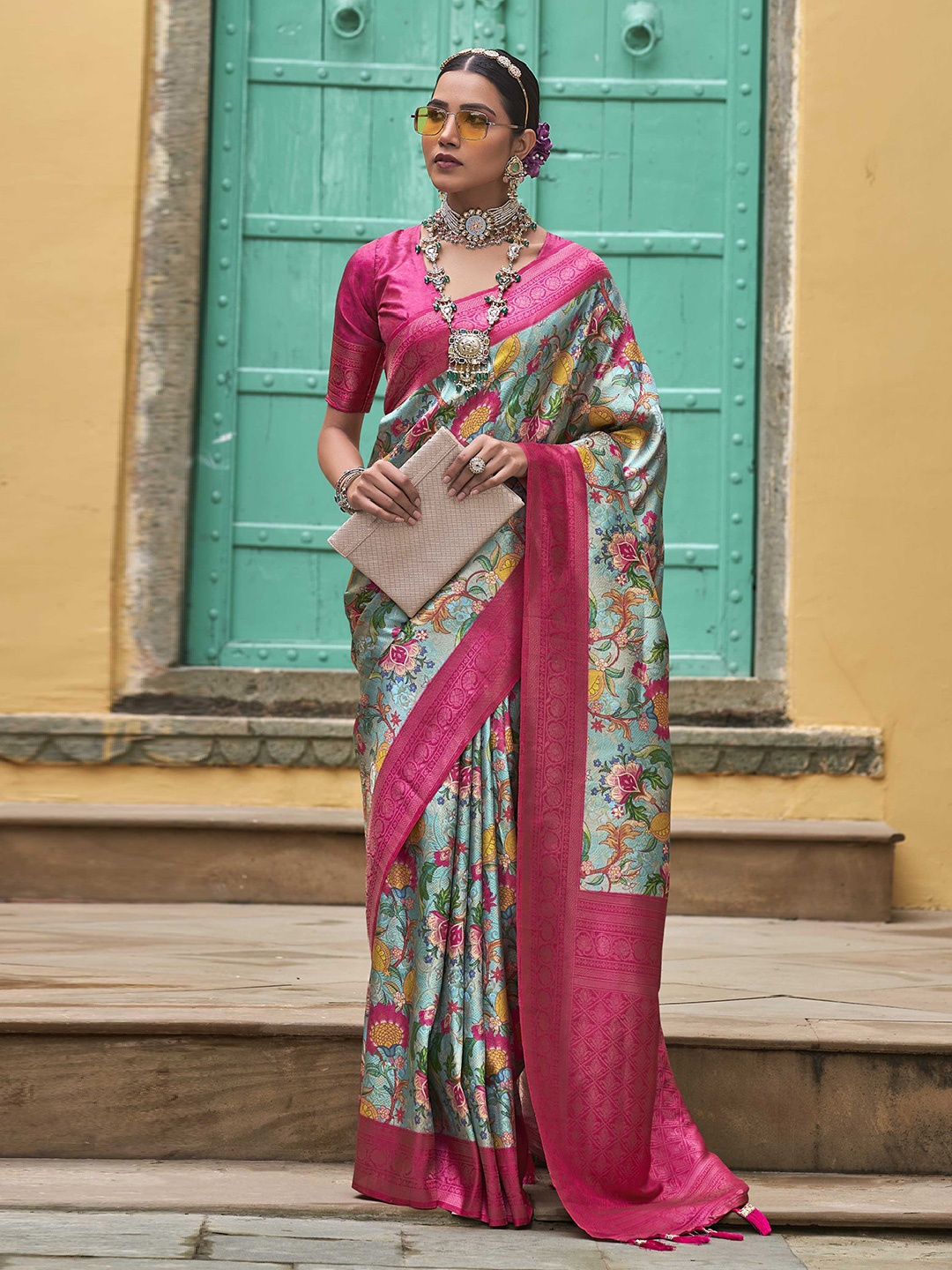 

Mitera Blue Floral Woven Designed Zari Kanjeevaram Saree