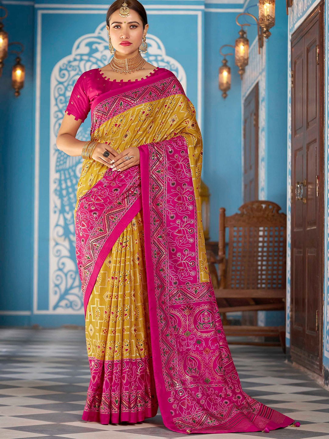 

Mitera Mustard Yellow Ethnic Motifs Printed Saree