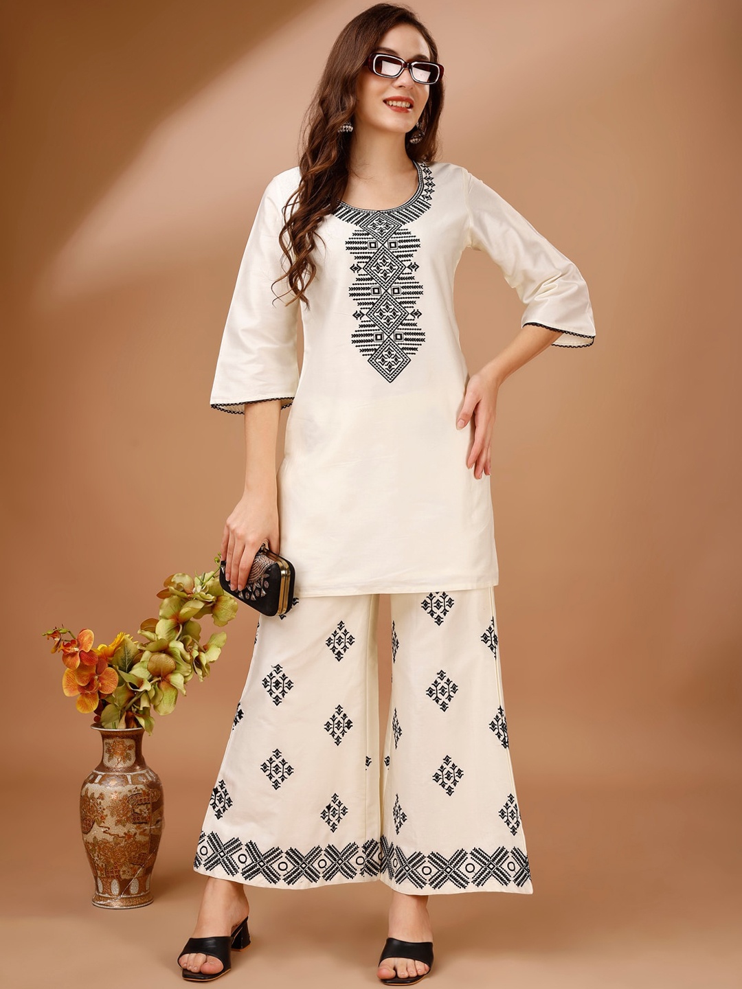 

Tikhi Imli Women Ethnic Motifs Embroidered Regular Thread Work Kurta with Palazzos, Off white