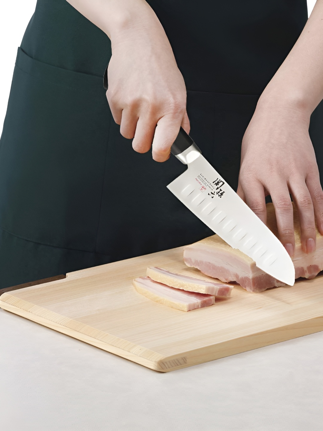 

KAI Silver toned & Black Stainless Steel Knife