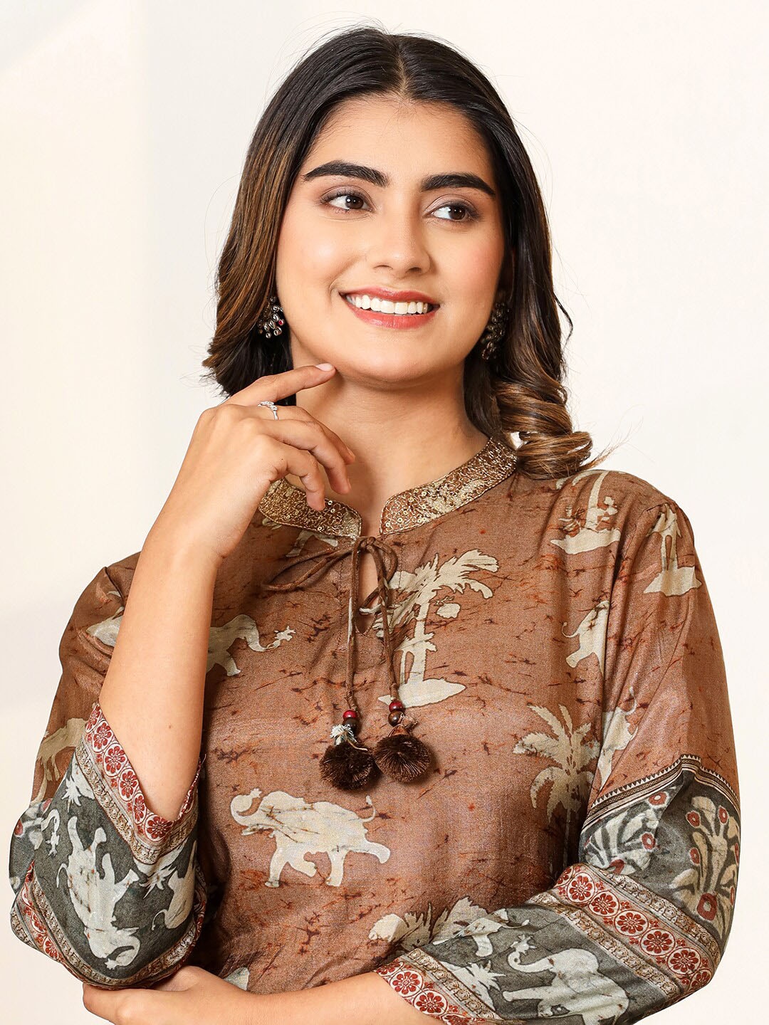 

Vishudh Brown Floral Printed Tie-Up Neck Kurta with Salwar