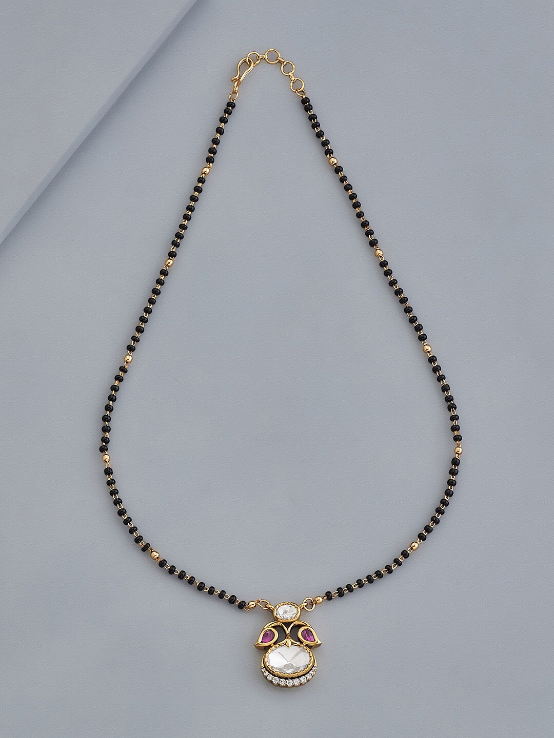 

Kushal's Fashion Jewellery Zircon and Beads Mangalsutra, Gold