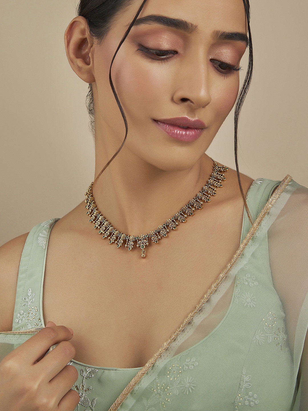 

Kushal's Fashion Jewellery Artificial Stones Gold Plated Antique Necklace