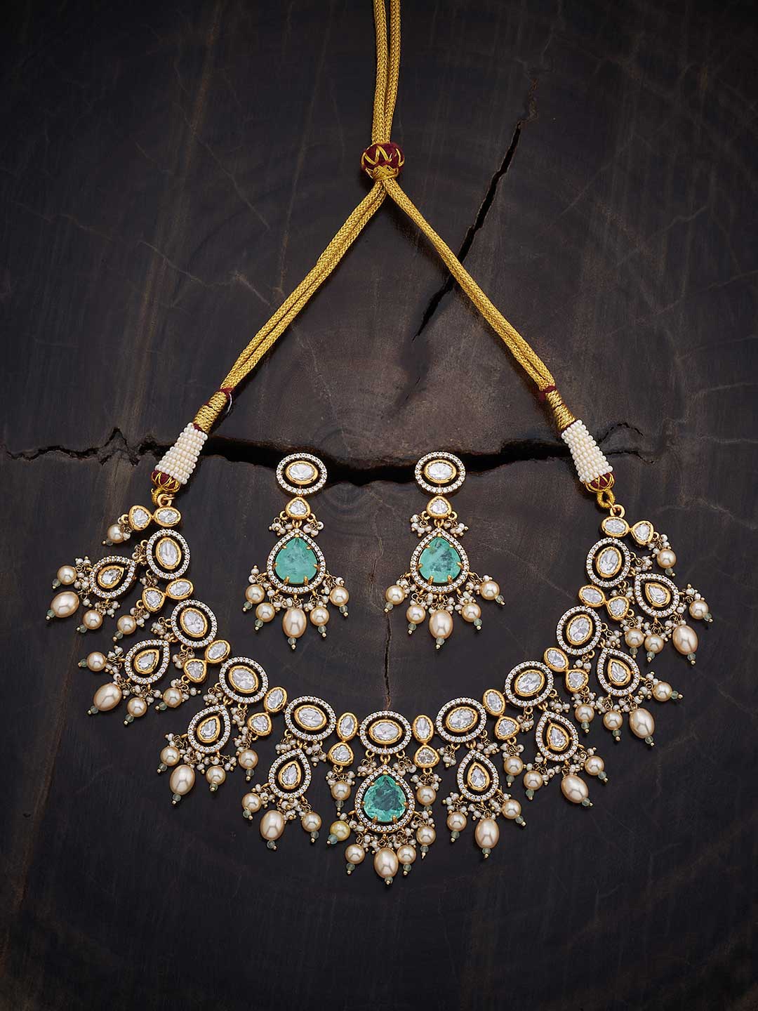 

Kushal's Fashion Jewellery Gold Plated Kundan Studded & Beaded Jewellery Set