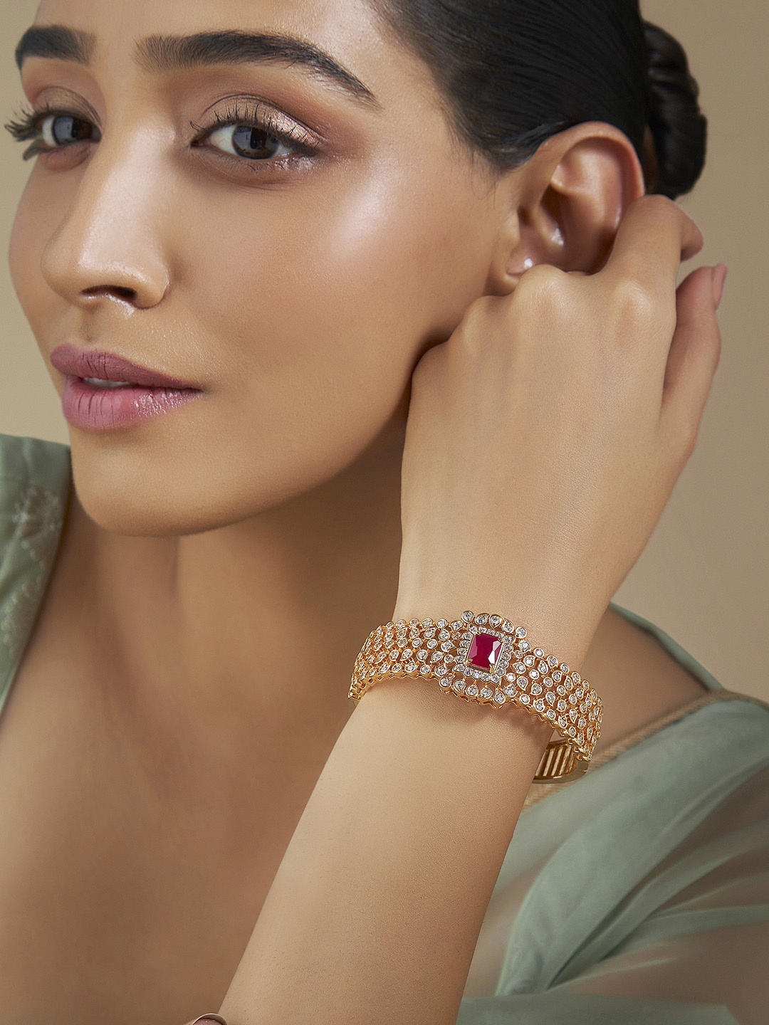 

Kushal's Fashion Jewellery Cubic Zirconia Gold-Plated Bangle-Style Bracelet