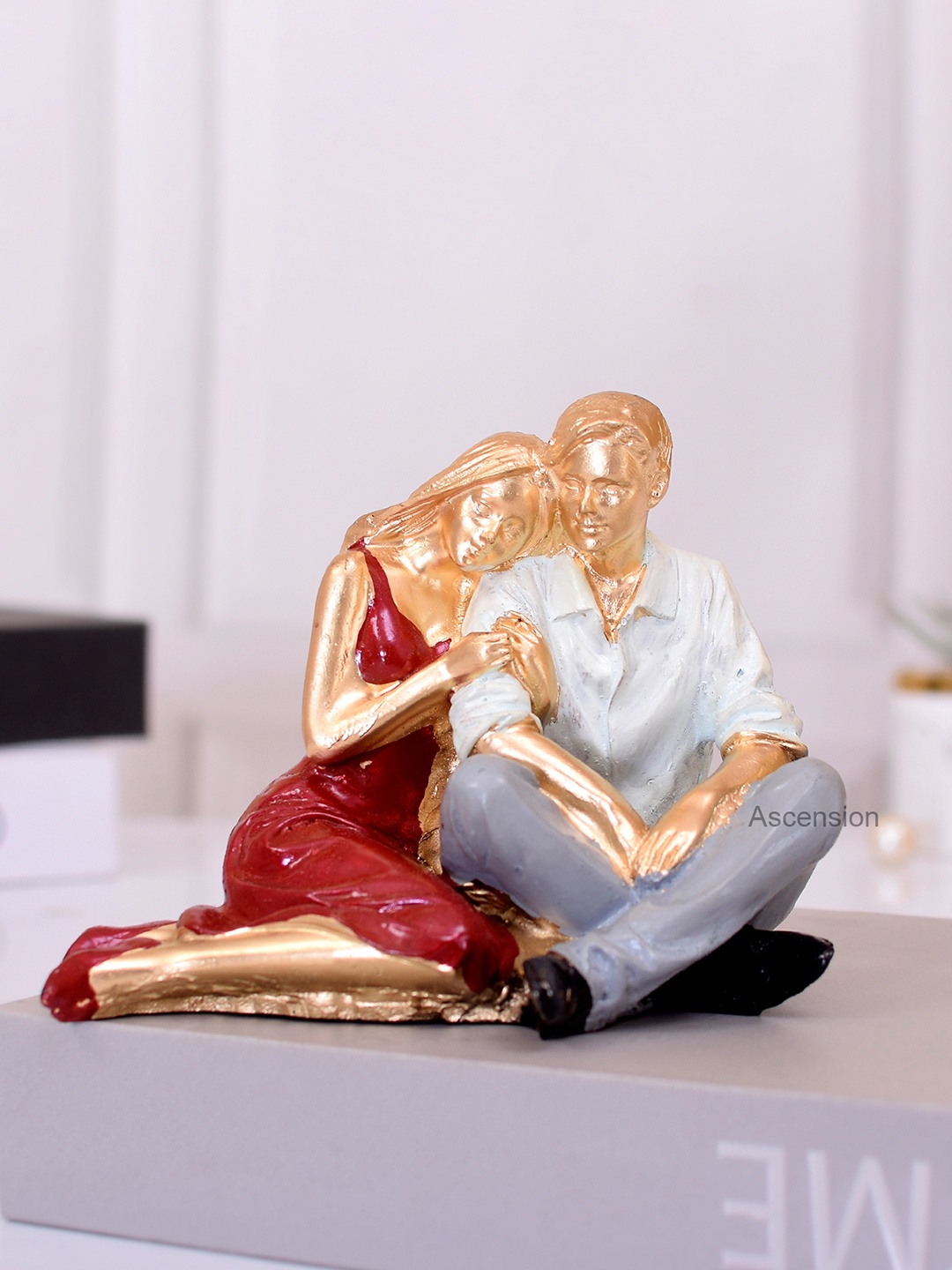 

Ascension Sitting Couple Figurine Showpiece, Red