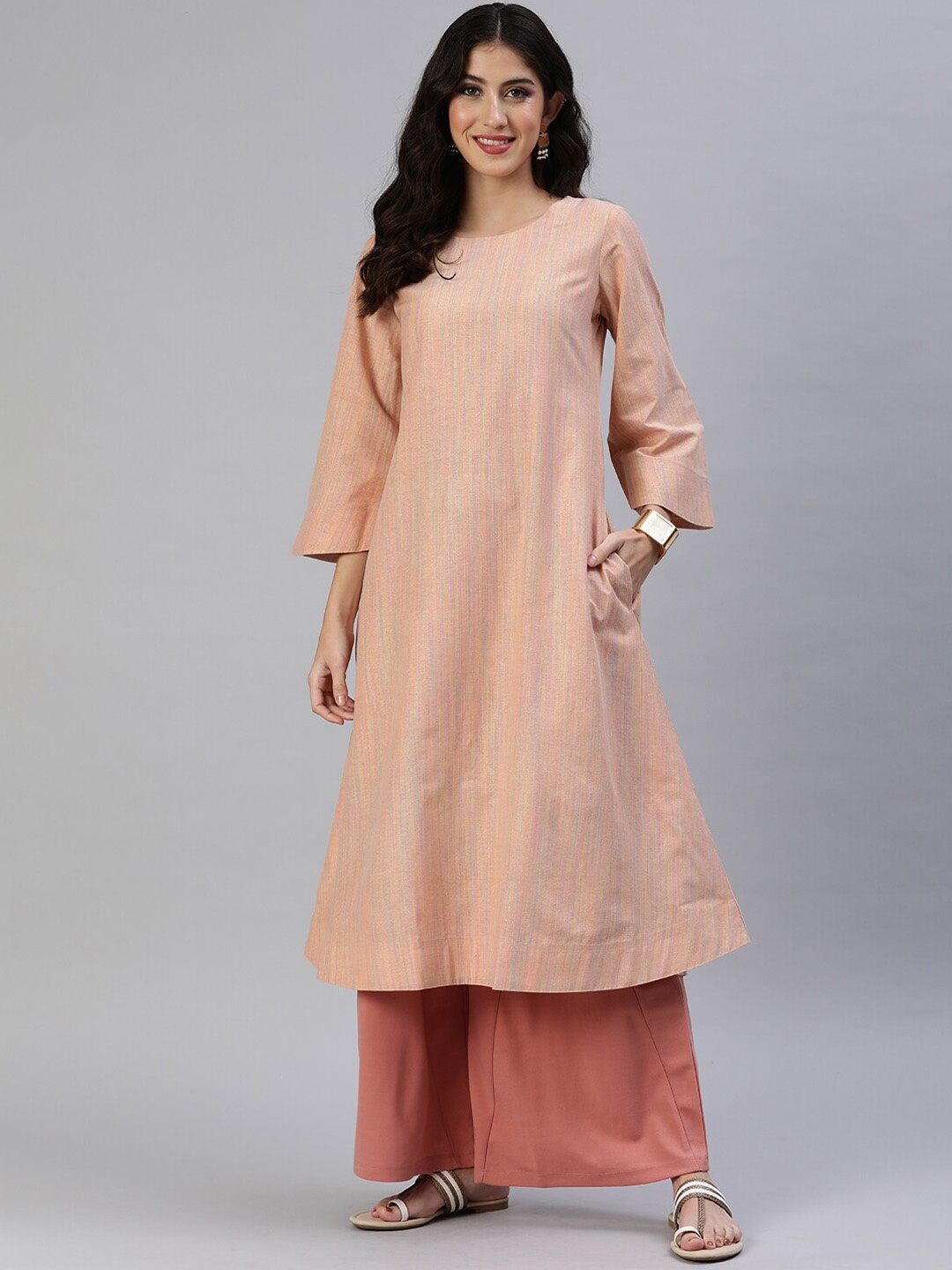 

Saanjh Women Embellished Flared Sleeves Thread Work Kurta, Peach