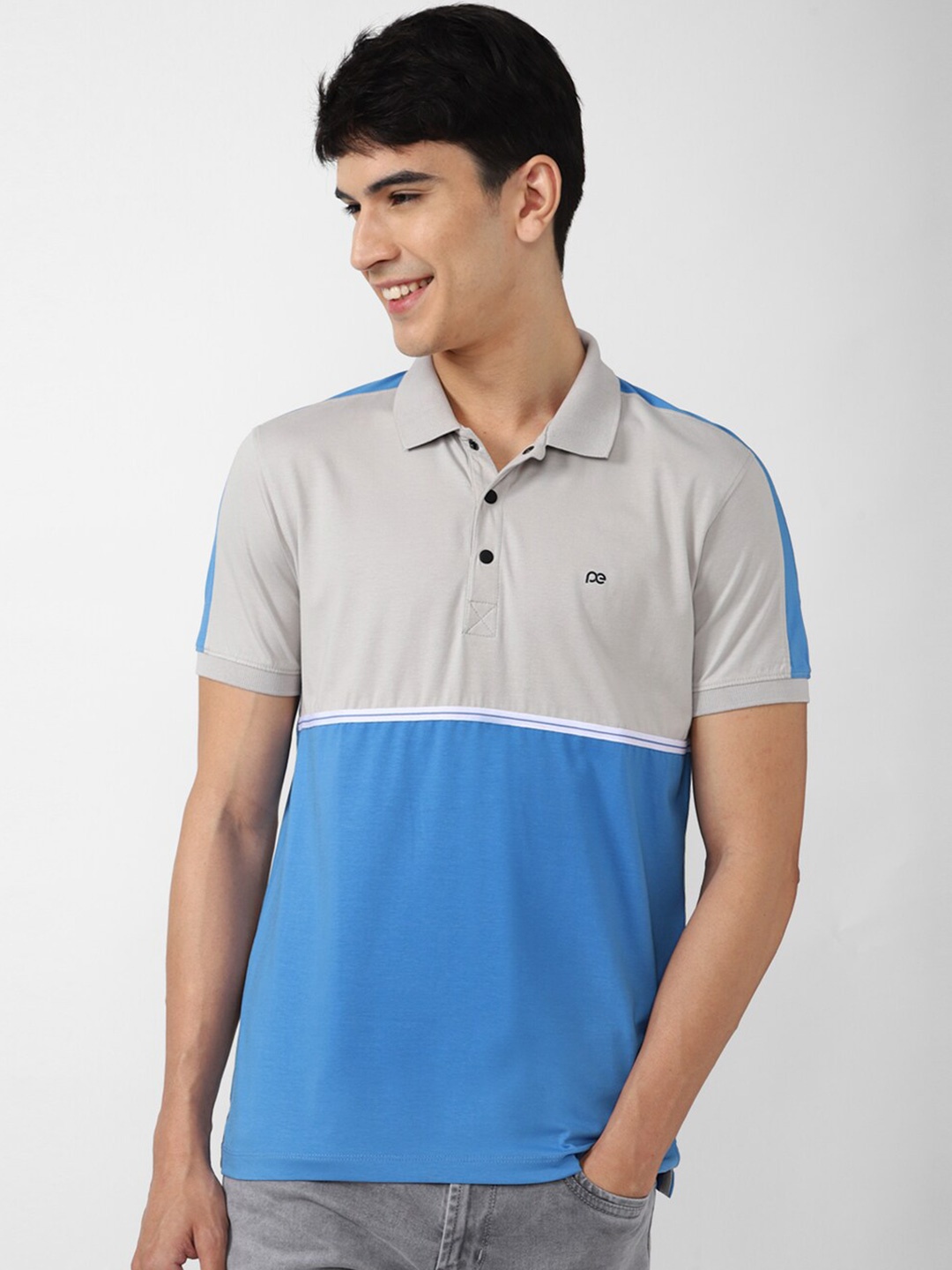 

Peter England Casuals Colourblocked Polo Collar Slim Fit Pure Cotton T-shirt, Blue