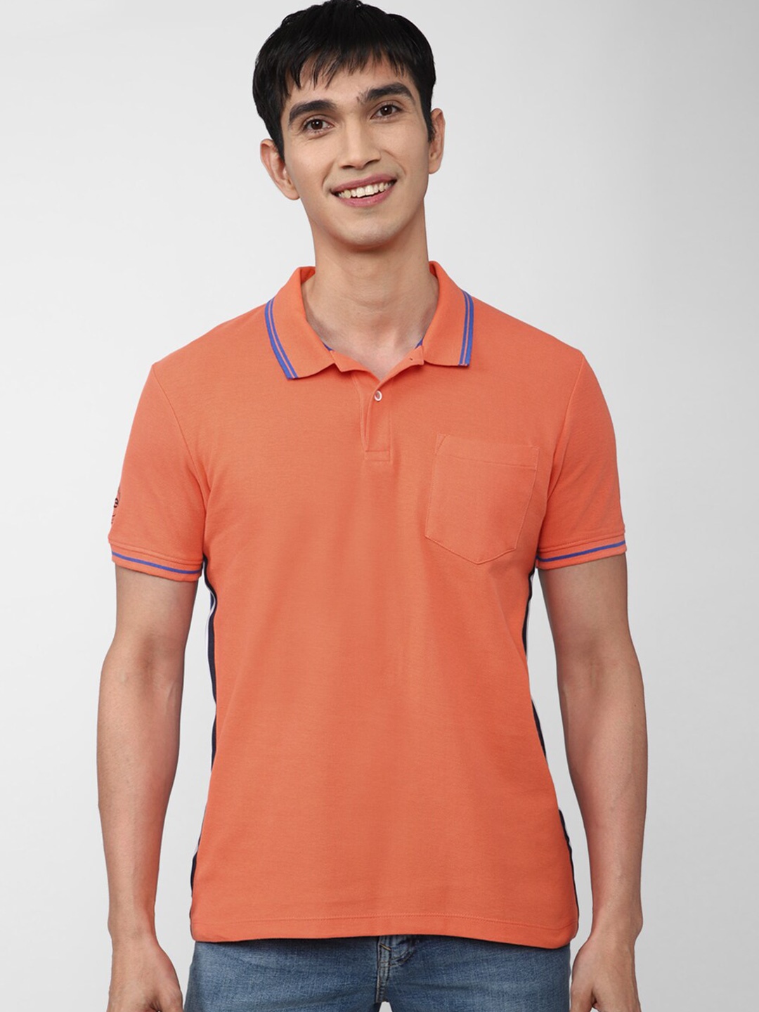 

Peter England Casuals Colourblocked Polo Collar Slim Fit T-shirt, Peach