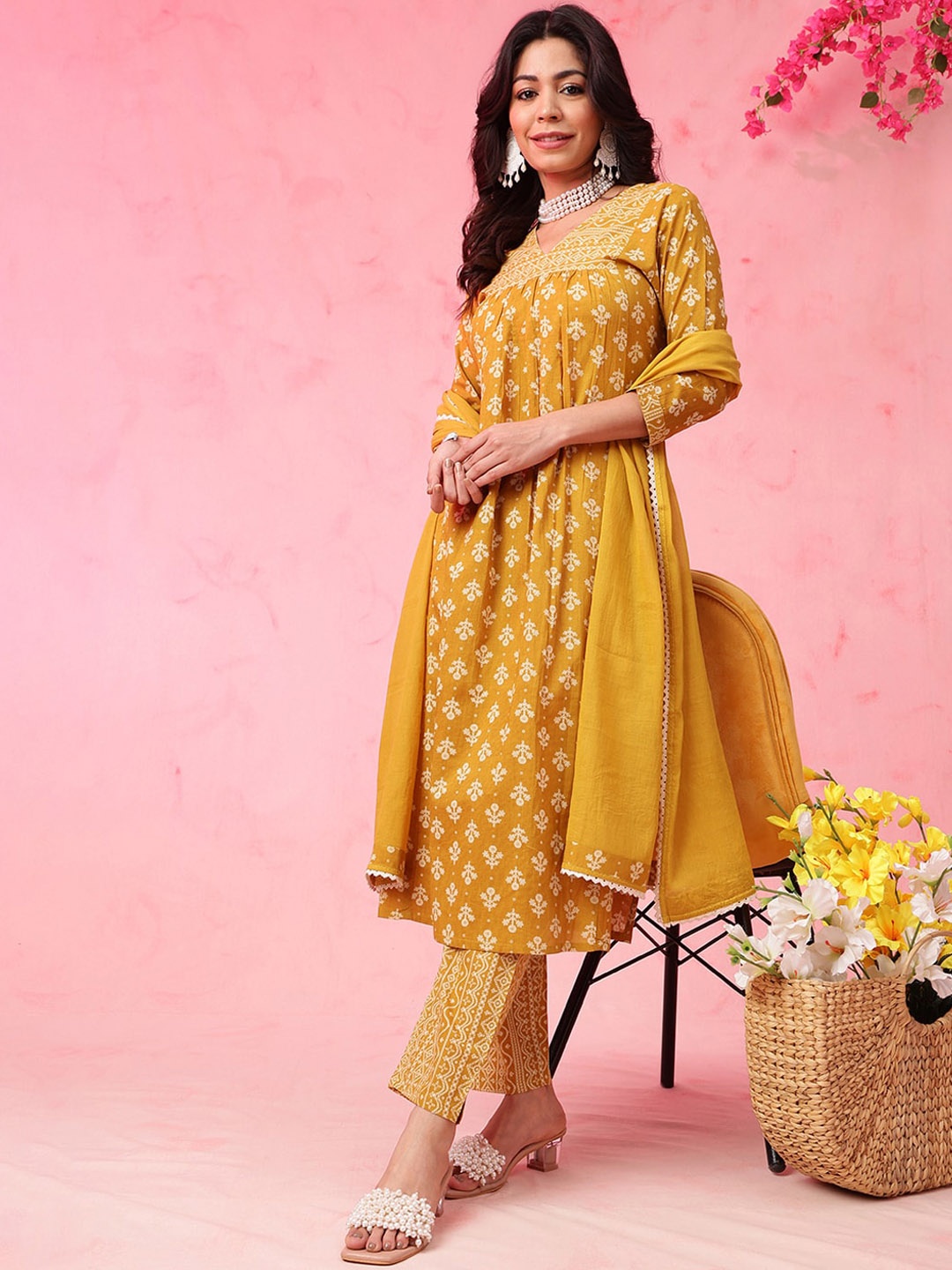 

Anouk Mustard Ethnic Motifs Printed V-Neck Straight Kurta with Trousers & Dupatta