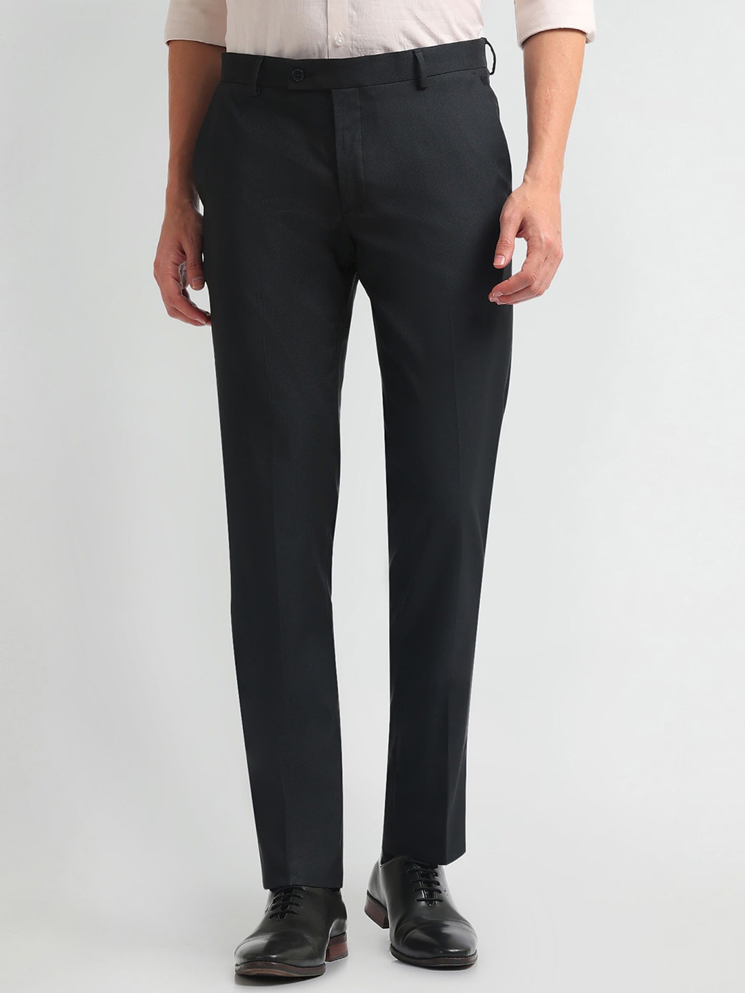 

Arrow Men Solid Mid-Rise Tapered Fit Formal Trousers, Blue